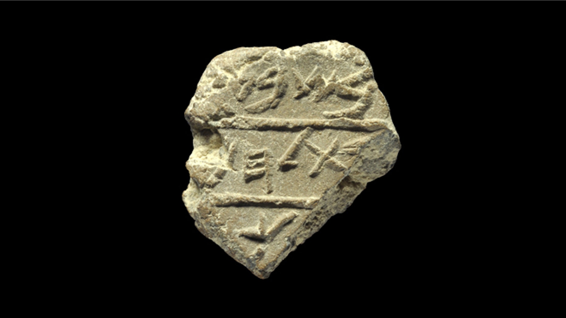 In this photo made available, Wednesday, May 22, 2012 by Israel's Antiquities Authority, shows a detail of a seal bearing the name "Bethlehem" in ancient Hebrew script.