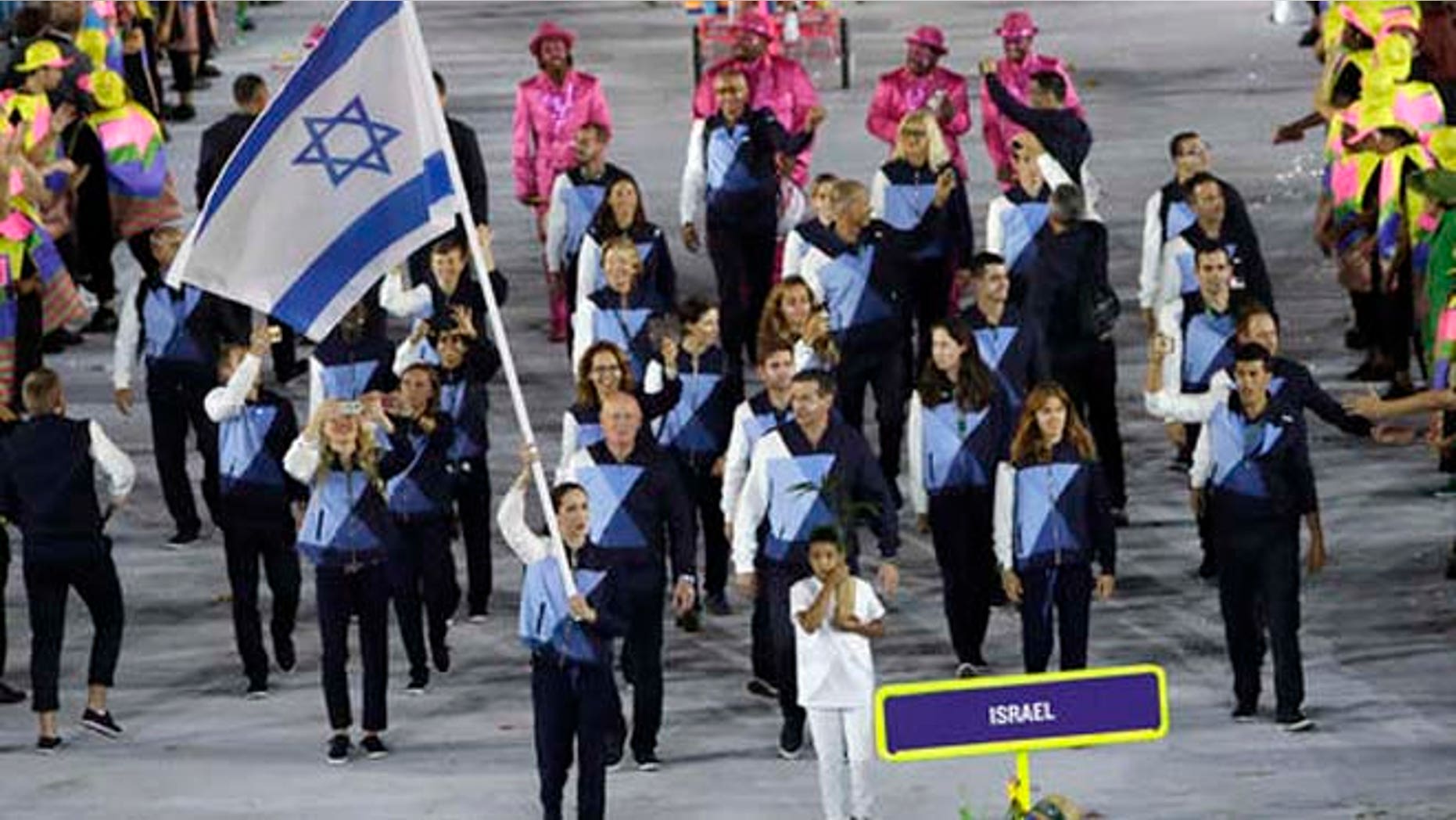Neta Rivkin carries the flag of Israel during the opening ceremony for the 2016 Summer Olympics in Rio de Janeiro, Brazil, Friday, Aug. 5.
