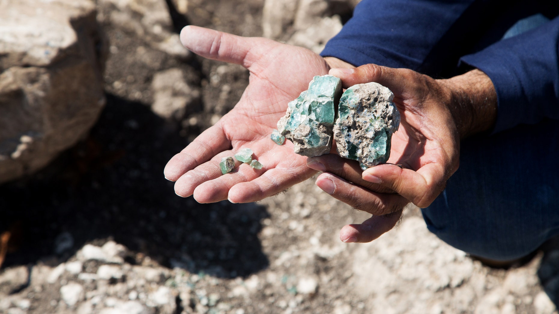 Small fragments of the raw glass as they were found at the site.(Photo: Assaf Peretz, courtesy of Israel Antiquities Authority)
