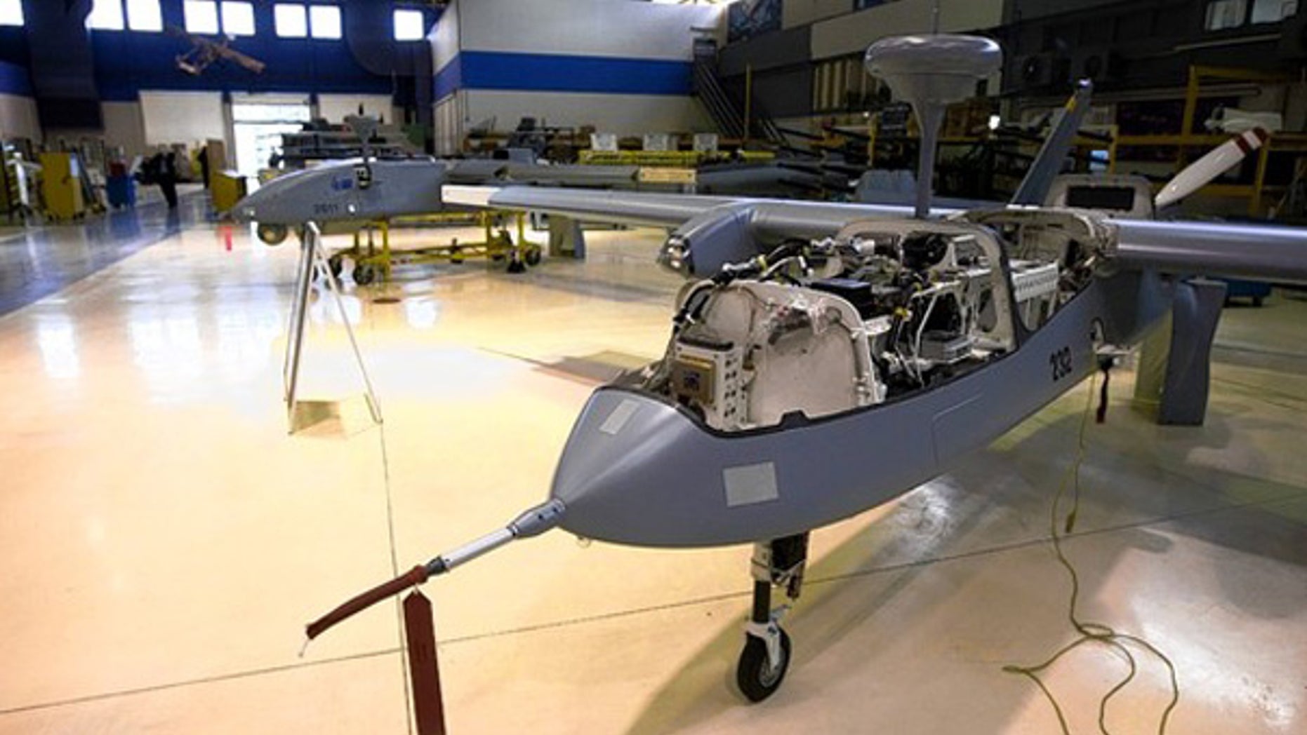 Israel pioneered the use of aerial drones like the Heron, under construction, above, at Israeli Aerospace Industries. (David Furst/AFP for The Wall Street Journal)