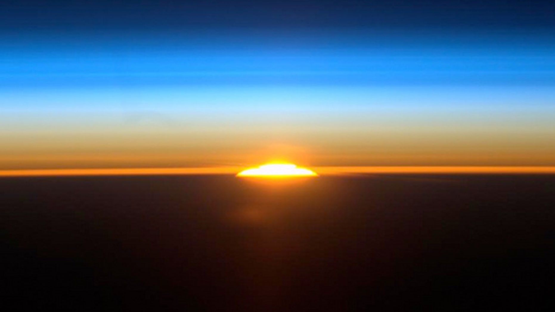 Nickel-eating bacteria may have worsened the mass die-off some 250 million years ago, scientists suggest. (Shown here, International Space Station astronaut Ron Garan captures one of the 16 sunrises they see each day, on Aug. 27, 2011.)