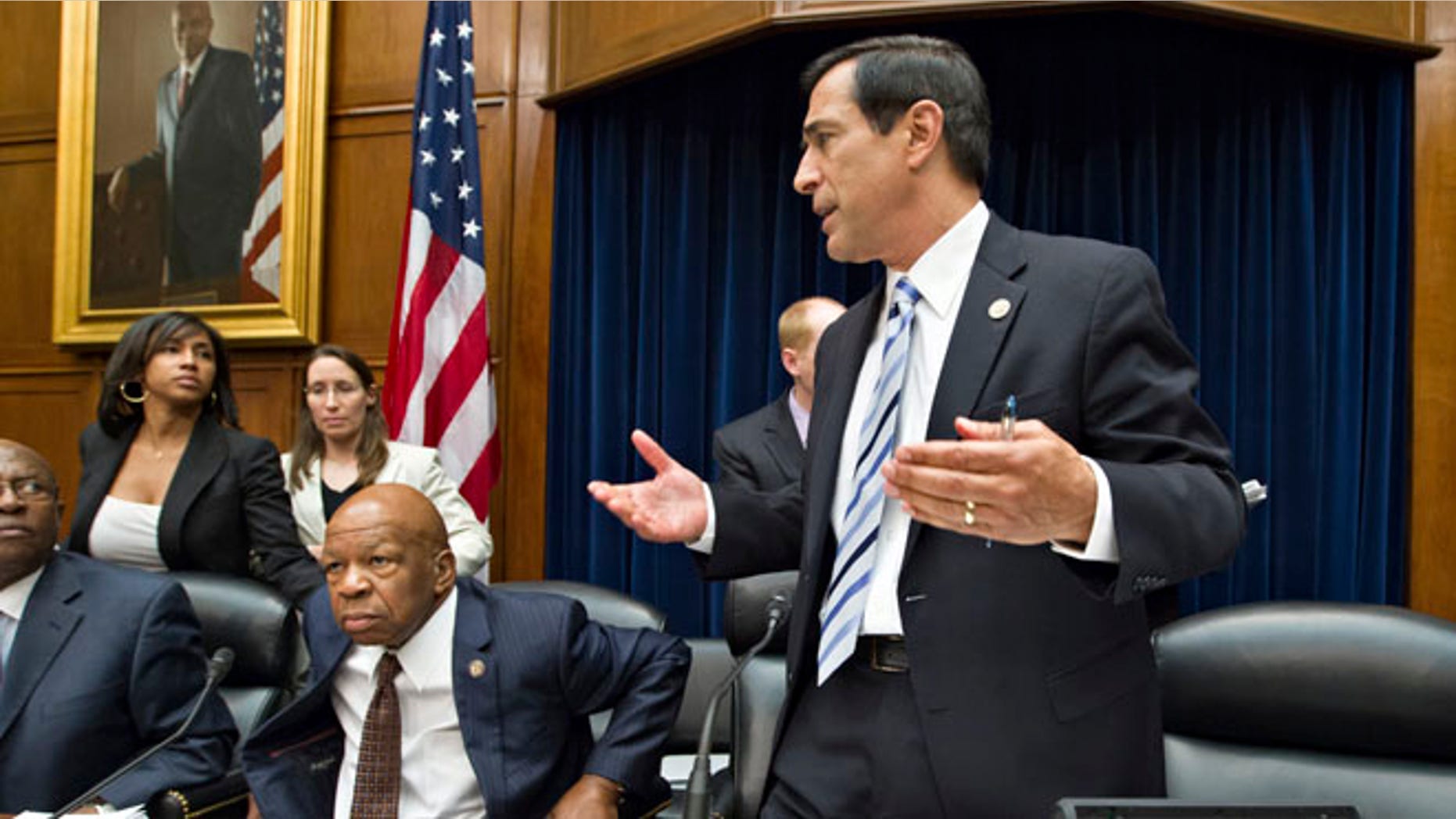 FILE: June 20, 2012: Rep. Darrell Issa, R-Calif., right, adjourns a meeting of the House Oversight and Government Reform Committee, in Washington, D.C.