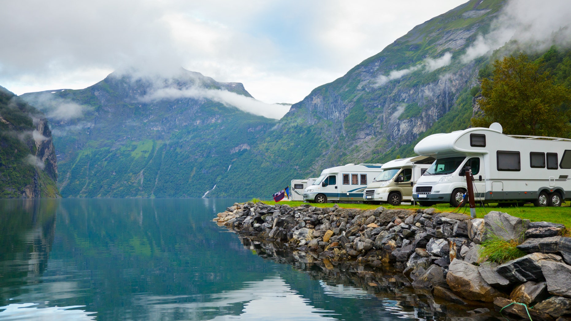 Motorhomes at campsite by the Geirangerfjord in Norway