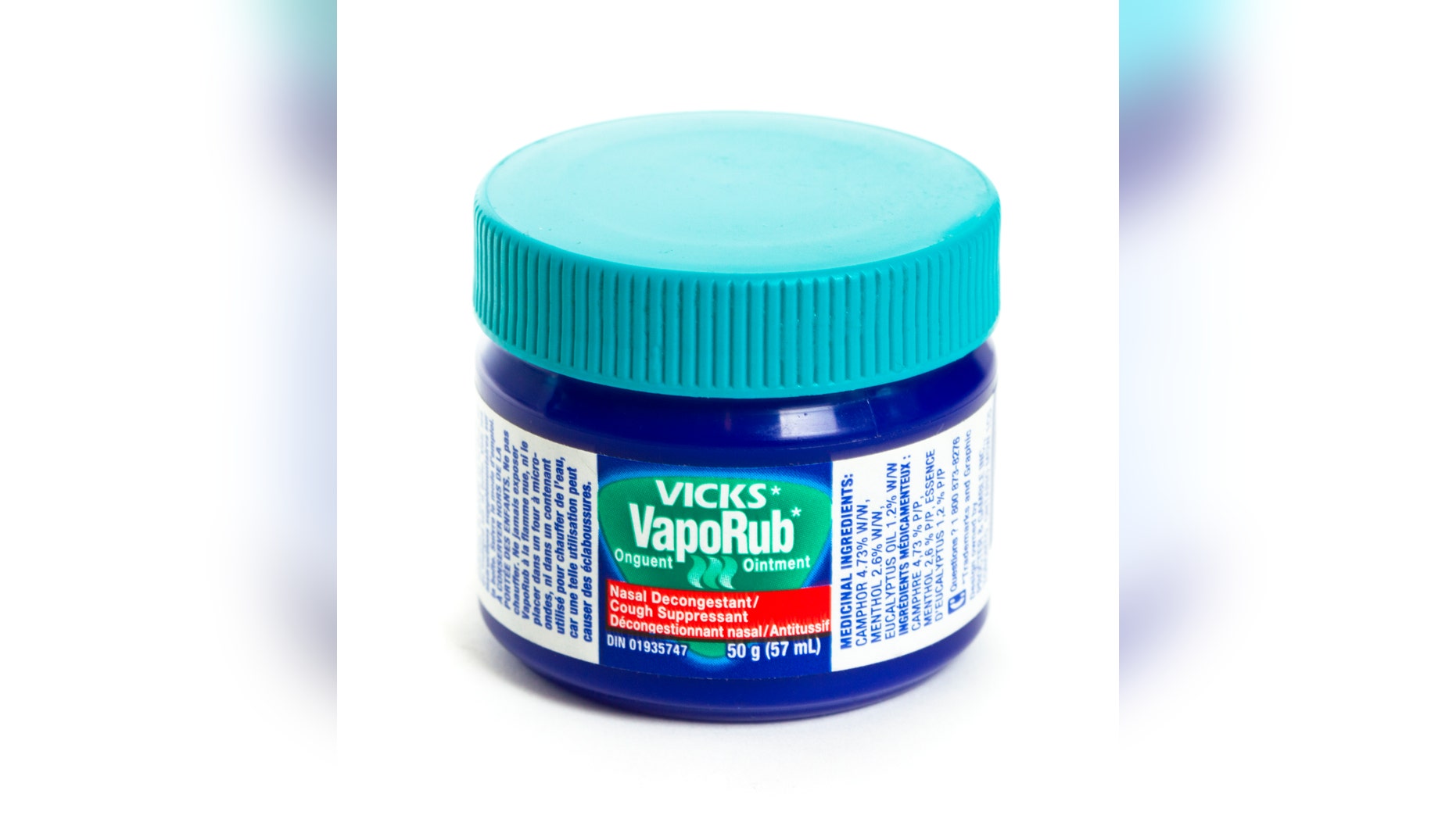 "Chatham, Ontario, Canada - February 17, 2011: An isolated 50 g jar of Vick's VapoRub which is a product of Procter & gamble inc. Vick's VapoRub is commonly used for the relief of nasal congestion and muscle aches due to cold."