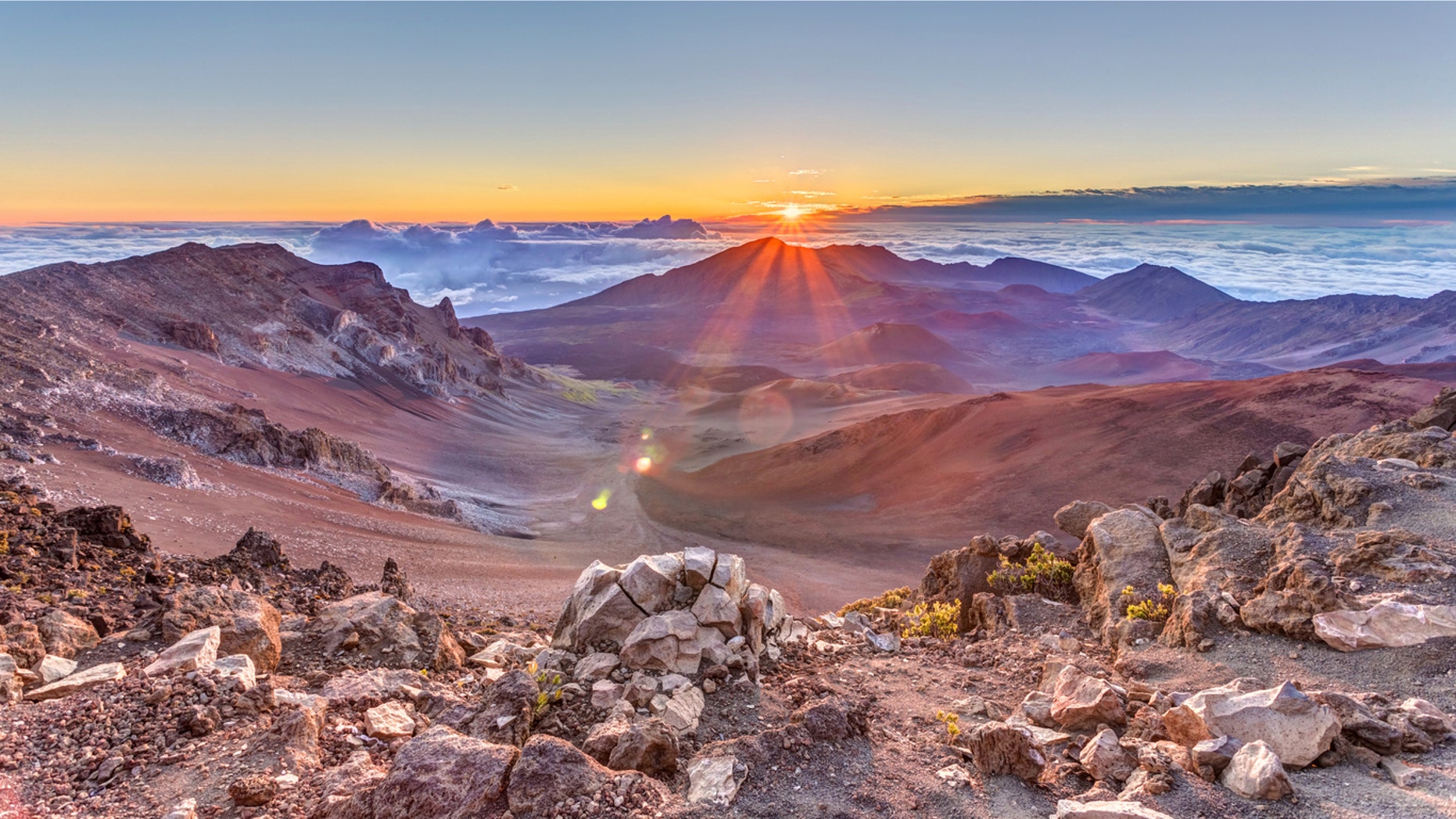 Sunrise from the summit of Haleakala volcano on the tropical island of Maui, Hawaii.