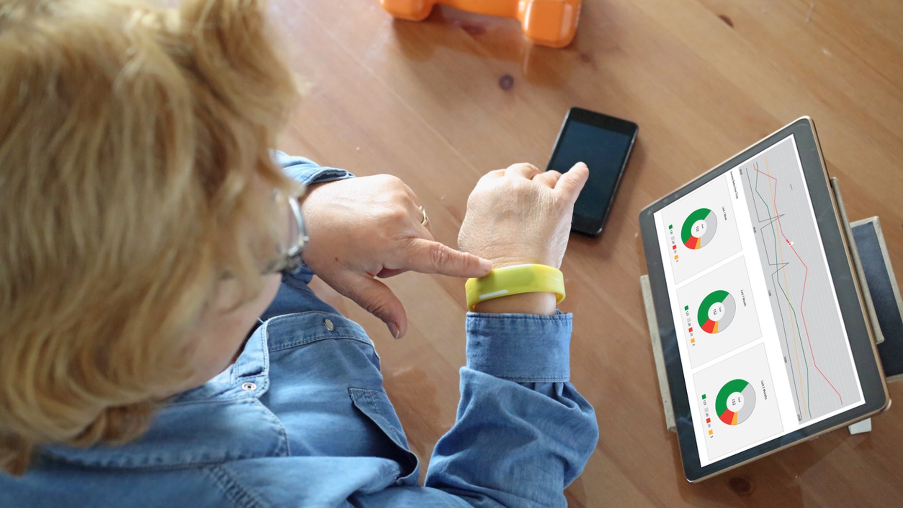 Senior woman using health technology