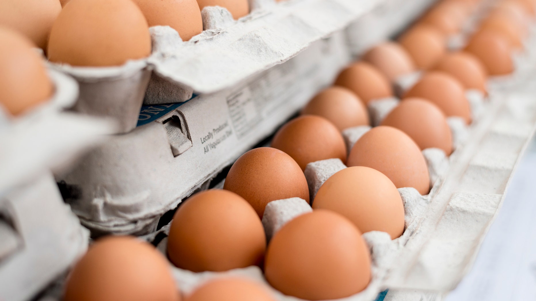 Crates of eggs at farmers market.