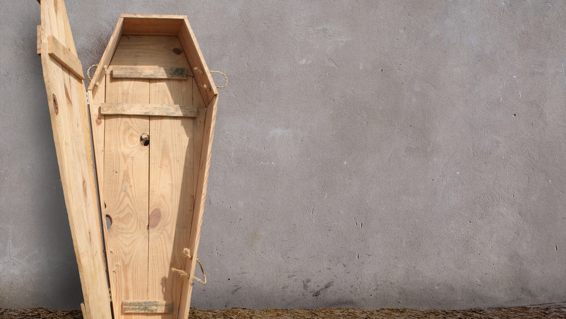 The theme park has announced a competition inviting guests to stay in a tight coffin for nearly 30 hours straight.