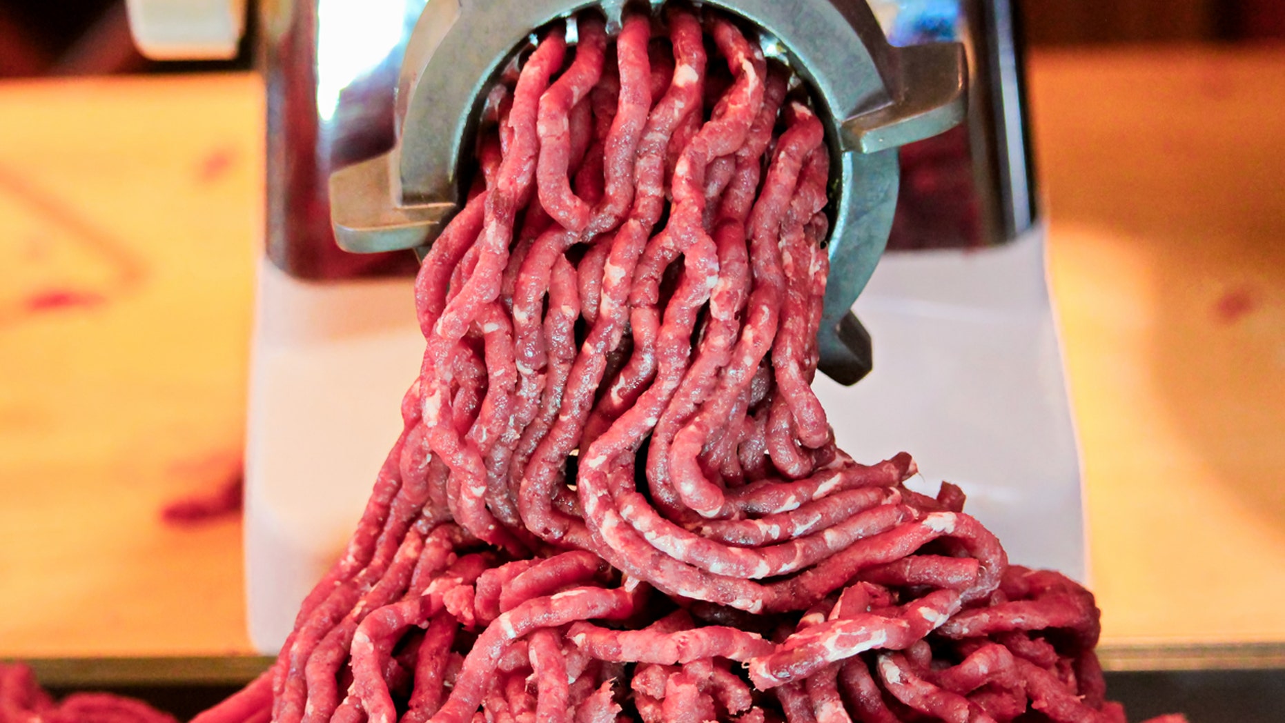 hand in meat grinder