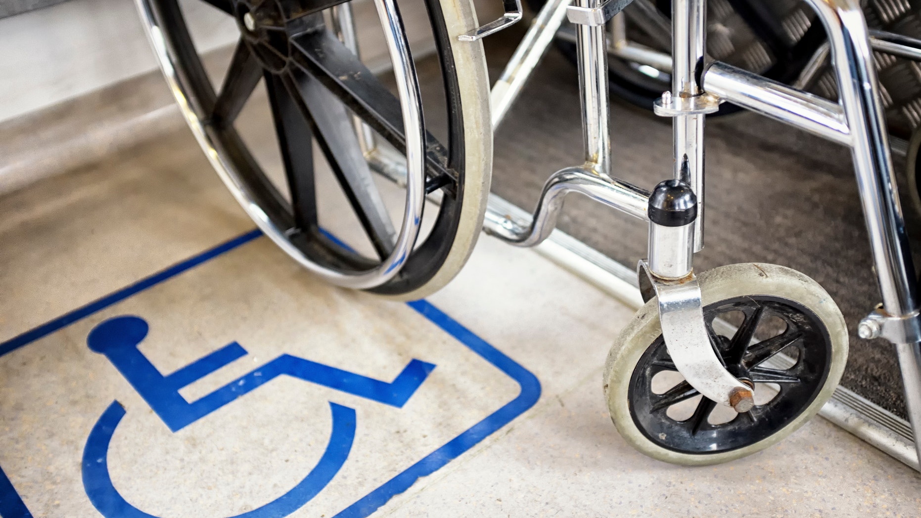 disabled sign and wheel chair - photo