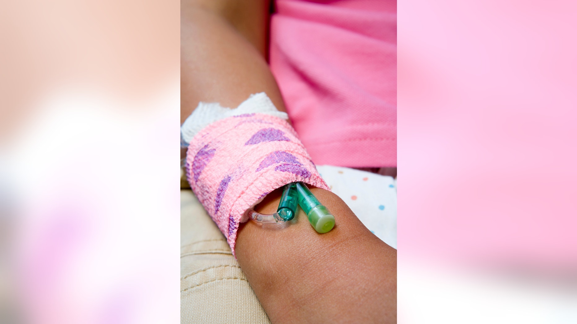 Girl with a catheter in her arm