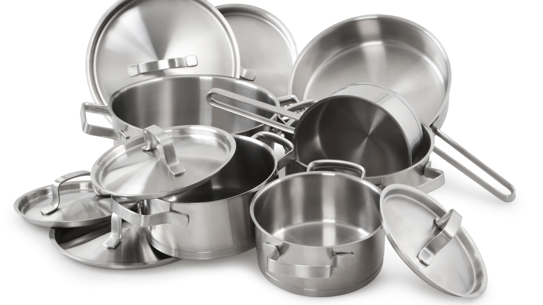 Stainless steel pots and pans isolated on white background
