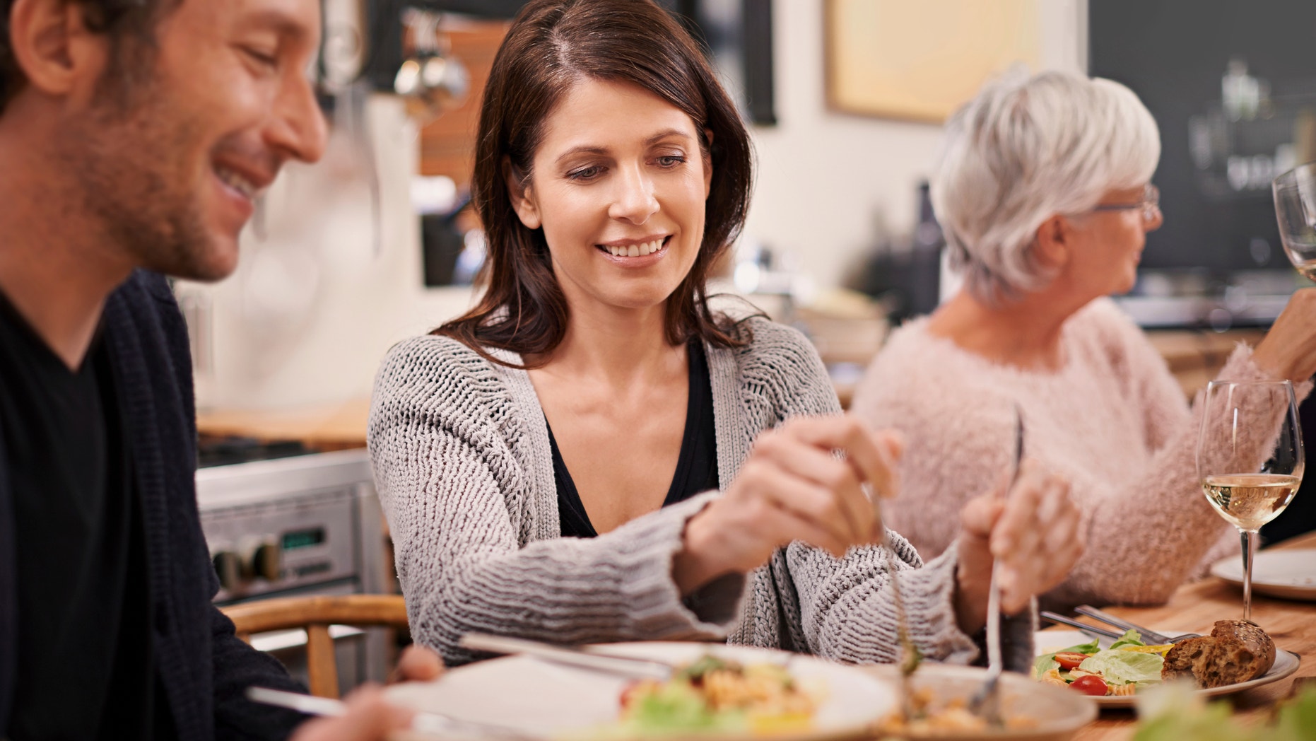 Cropped shot of a family sitting down to dinnerhttp://195.154.178.81/DATA/i_collage/pi/shoots/784006.jpg
