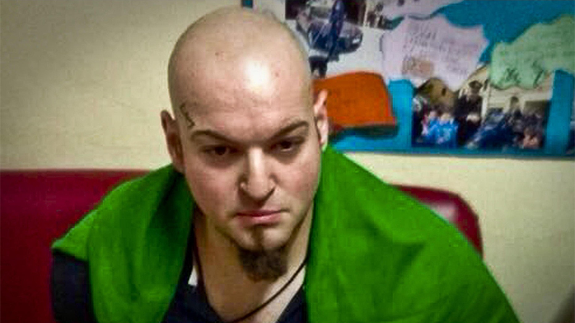 A picture showing a man identified by the Italian Carabinieri, paramilitary police, as Luca Traini, who is accused of having shot with a firearm to several people in Macerata, Italy, Saturday.