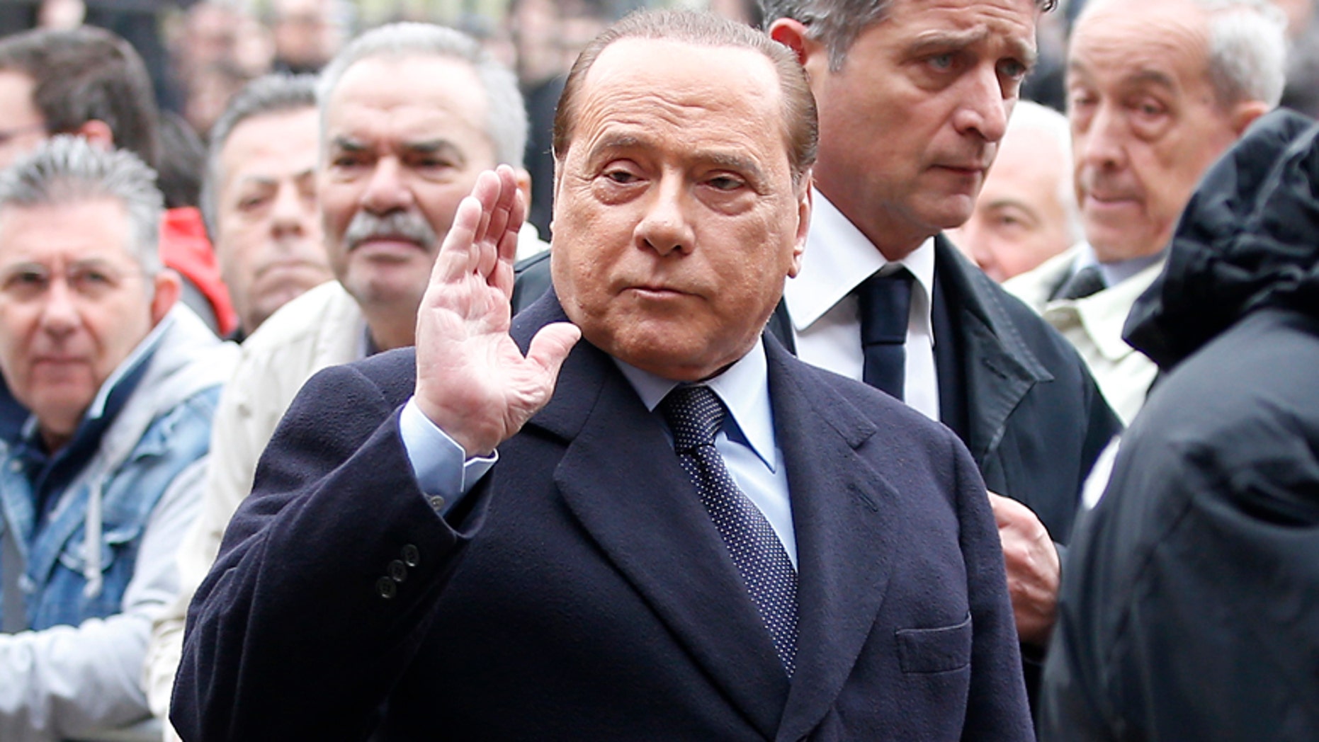 April 5, 2016: Former Premier Silvio Berlusconi attends the funeral of Italy coach Cesare Maldini at the Sant Ambrogio's Basilica in Milan, Italy.