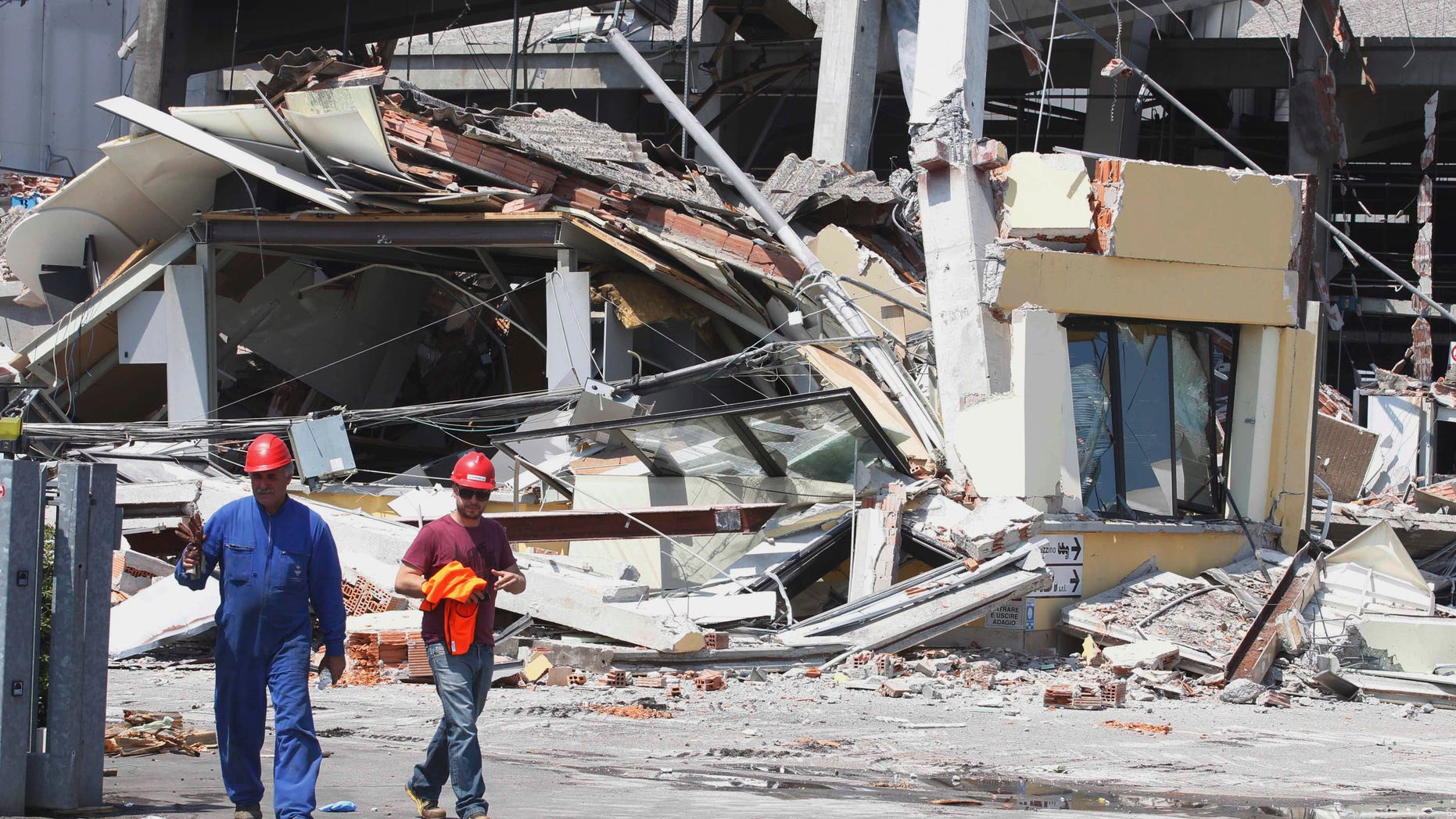 The collapsed BBG industrial moldings building is seen in Mirandola, northern Italy, Tuesday, May 29, 2012.