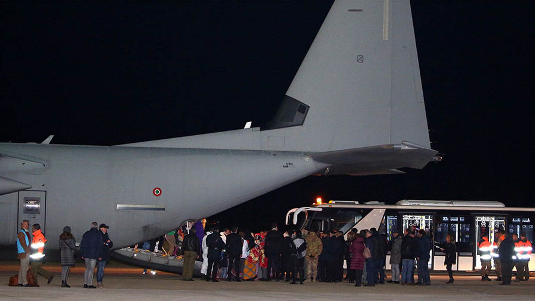 Dec. 22, 2017: Migrants from UNHCR detention centers in Libya arrive at an airport in Rome.