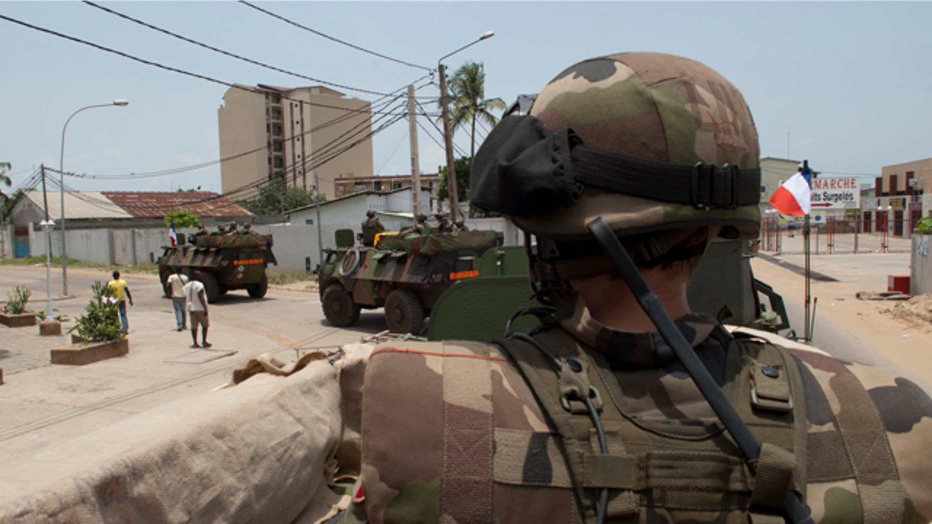 April 3, 2011: French soldiers patrol the Port Bouet district of Abidjan. President Obama has been criticized for paying little interest to the civil war gripping the Ivory Coast.