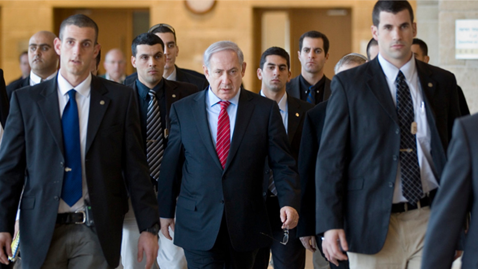 Jan. 3: Israeli Prime Minister Benjamin Netanyahu, center, surrounded by bodyguards, arrives at a Foreign Affairs and Security Committee meeting in the Knesset, Israel's parliament, in Jerusalem. (AP)
