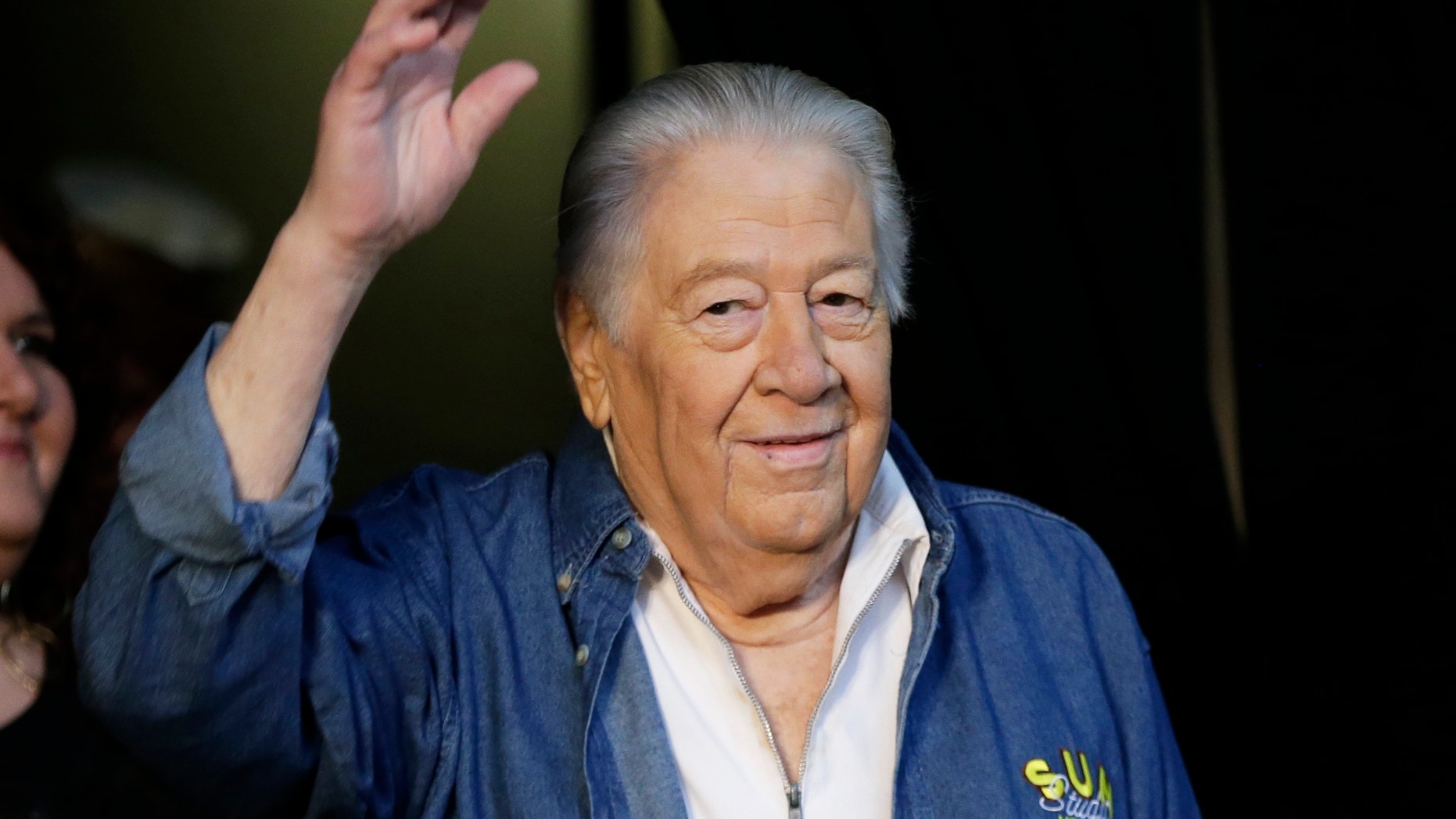 In this April 10, 2013 file photo, Jack Clement poses for photographers at the Country Music Hall of Fame in Nashville, Tenn. Clement, a producer, engineer, songwriter and beloved figure who helped birth rock ‘n’ roll and push country music into modern times, died Thursday morning, Aug. 8. He was 82.