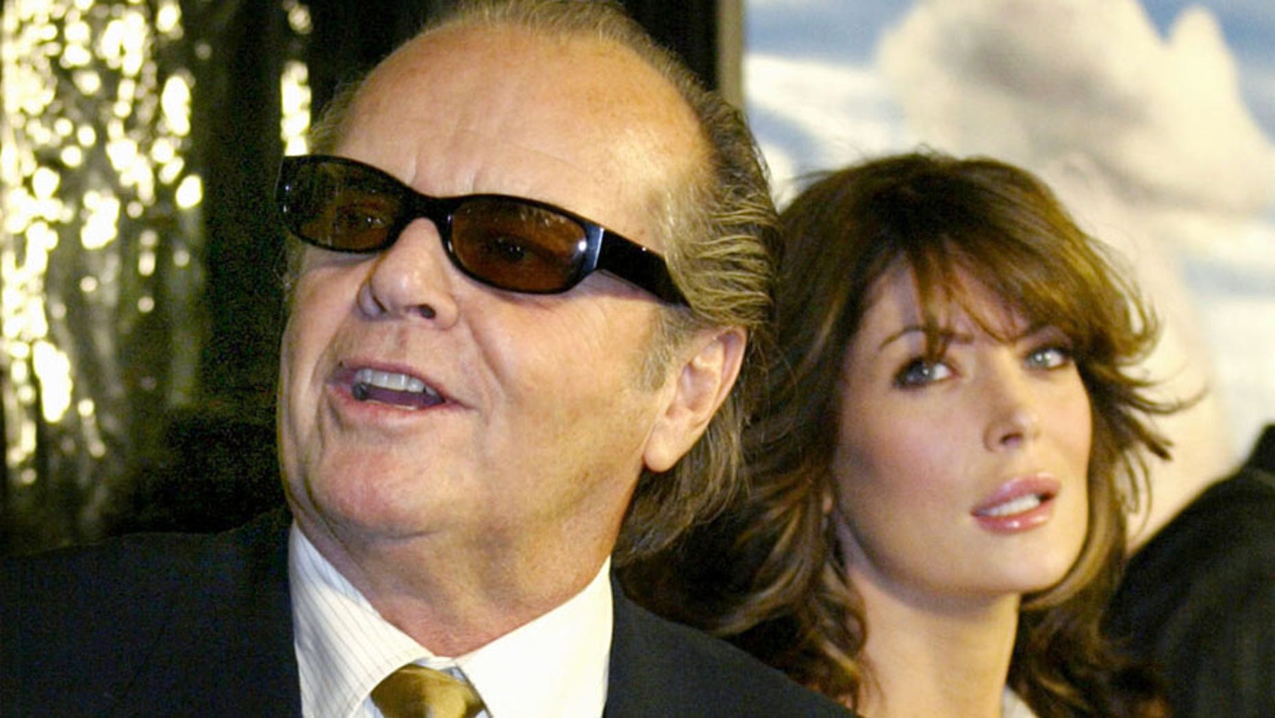 Three-time Academy Award winning actor Jack Nicholson arrives with LaraFlynn Boyle for the Los Angeles premiere of the film "About Schmidt,"December 12, 2002 in Beverly Hills, California. Nicholson stars as a man whohas reached life's crossroads and is searching for something meaningful inhis life. PP03110050 REUTERS/Robert GalbraithRG - RTRFBGF