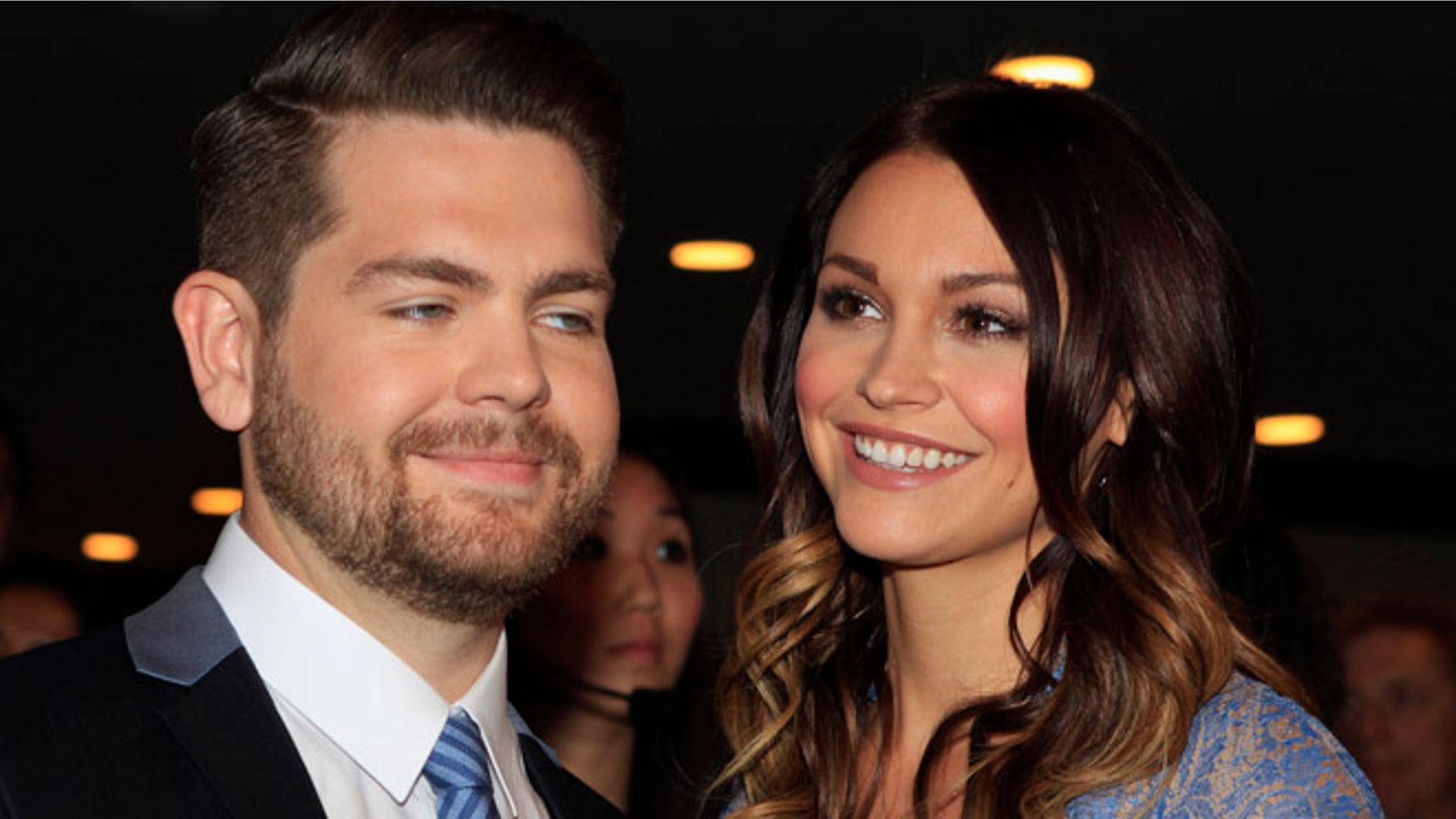 Jack Osbourne and wife Lisa Stelly pose as they arrive at the 20th annual Race to Erase MS benefit gala in Los Angeles, California May 3, 2013. The event raises money to fund research to find a cure for multiple sclerosis. REUTERS/Fred Prouser (UNITED STATES - Tags: ENTERTAINMENT) - RTXZ9TW