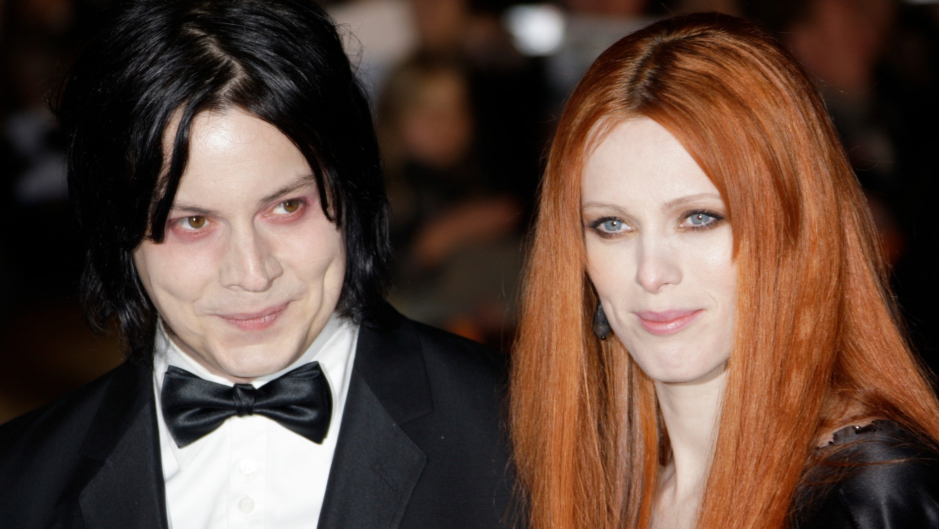 In this Oct. 29, 2008 file photo, musician Jack White, left, and Karen Elson arrive on the red carpet for the Royal World Premiere of the 22nd James Bond film, "Quantum of Solace" in London.