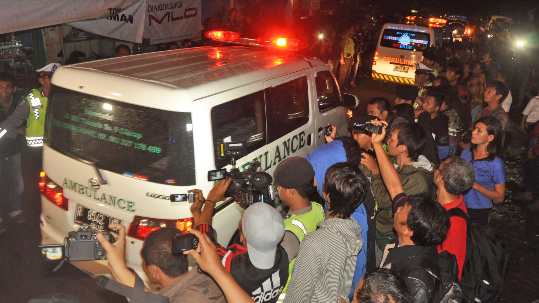 Jan. 18, 2015: Ambulances carrying the body of drug convicts Brazilian national Marco Archer Cardoso Moreira, left, and Dutch national Ang Kiem Soe leave upon arrival from Nusakambangan island where their executions were held, at Wijayapura port in Cilacap, Central Java, Indonesia