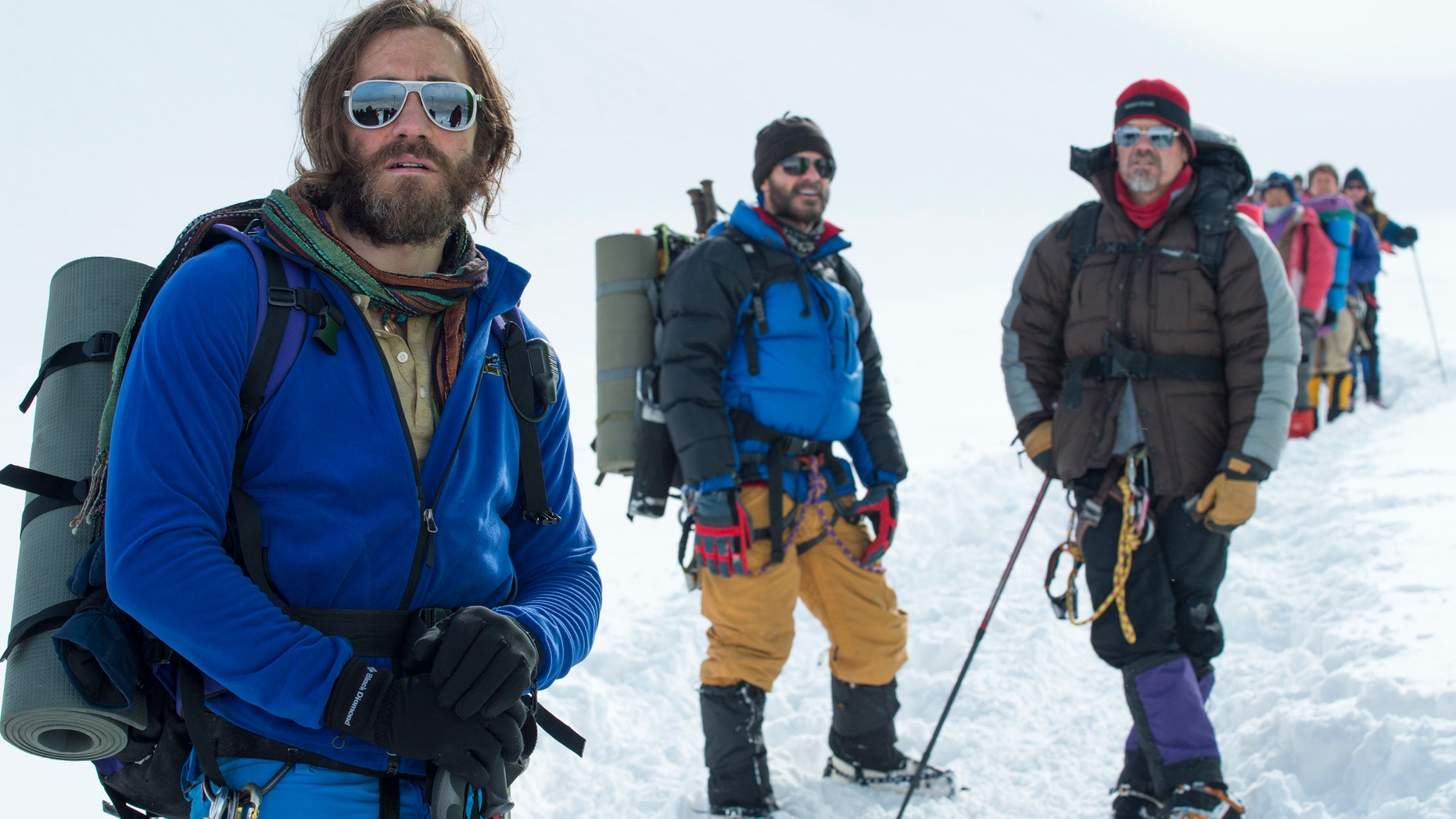 Jake Gyllenhaal, from left, as Scott Fischer, Michael Kelly as Jon Krakauer, and Josh Brolin as Beck Weathers, in the film "Everest."