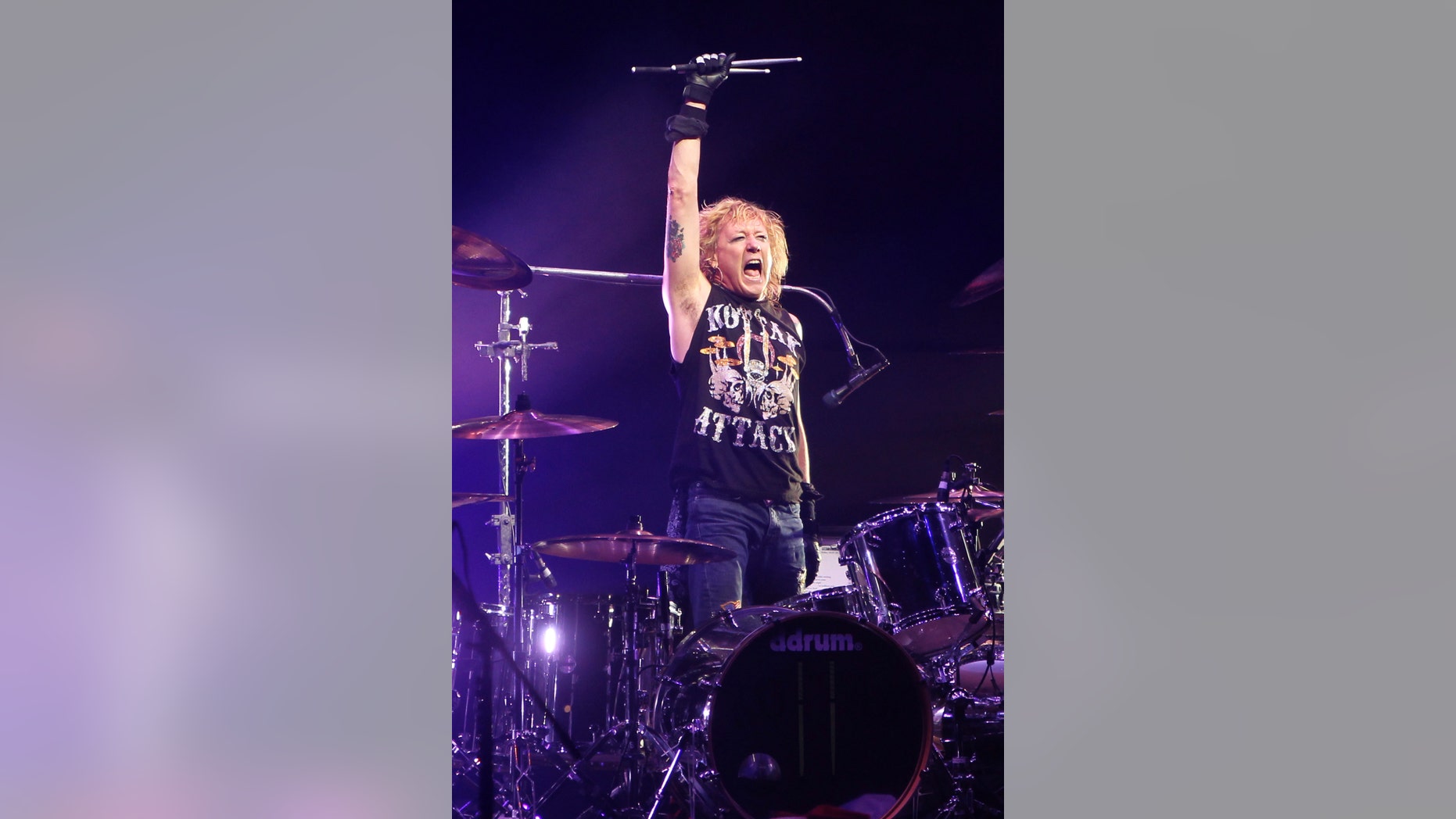 Musician James Kottak of the German band Scorpions performs during the annual Byblos International Festival in the ancient city of Byblos, north of Beirut, July 4, 2011. Picture taken July 4, 2011. REUTERS/ Mohamed Azakir (LEBANON - Tags: ENTERTAINMENT) - RTR2OHCT
