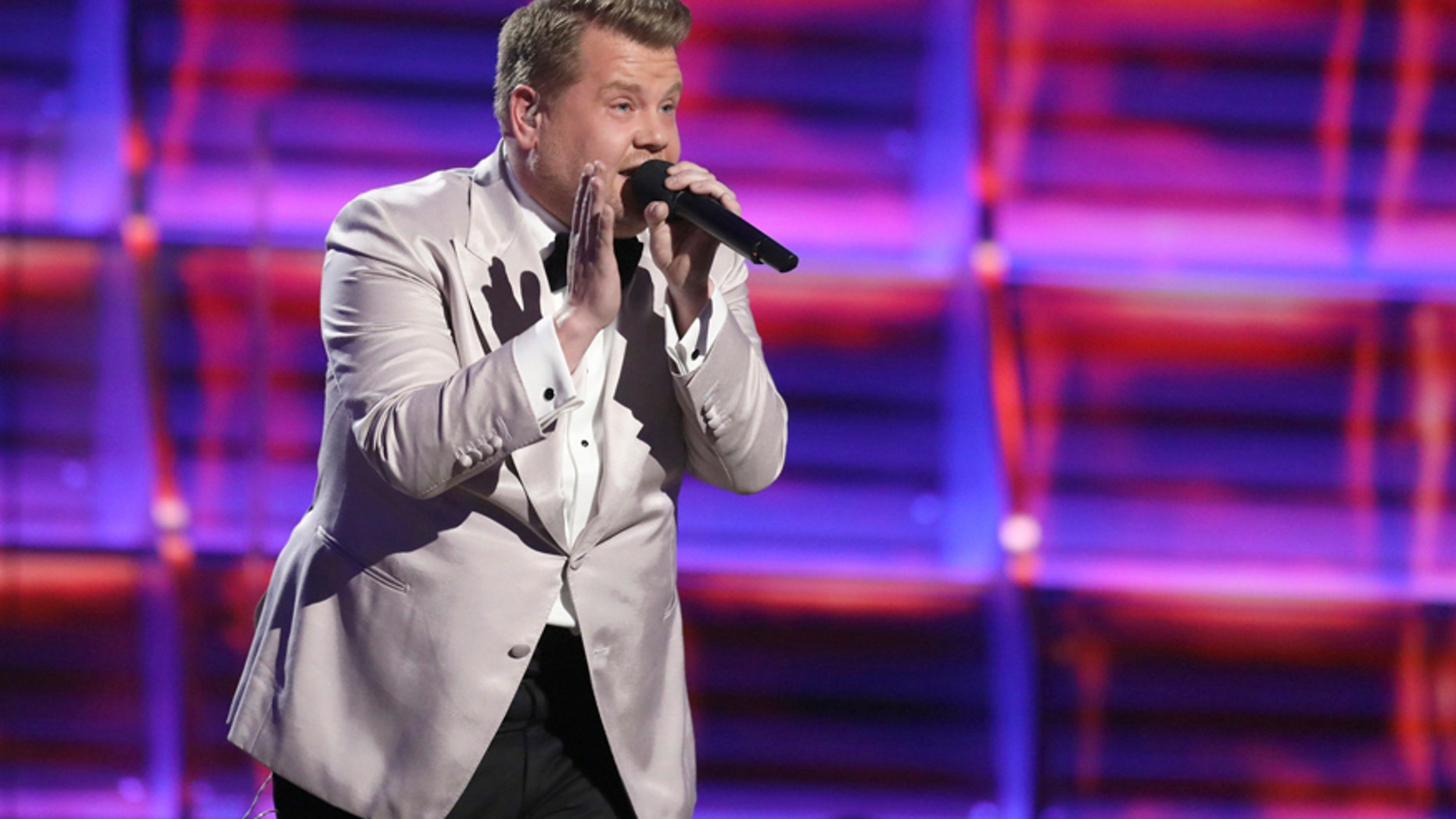Host James Corden raps at the 59th annual Grammy Awards on Sunday, Feb. 12, 2017, in Los Angeles.