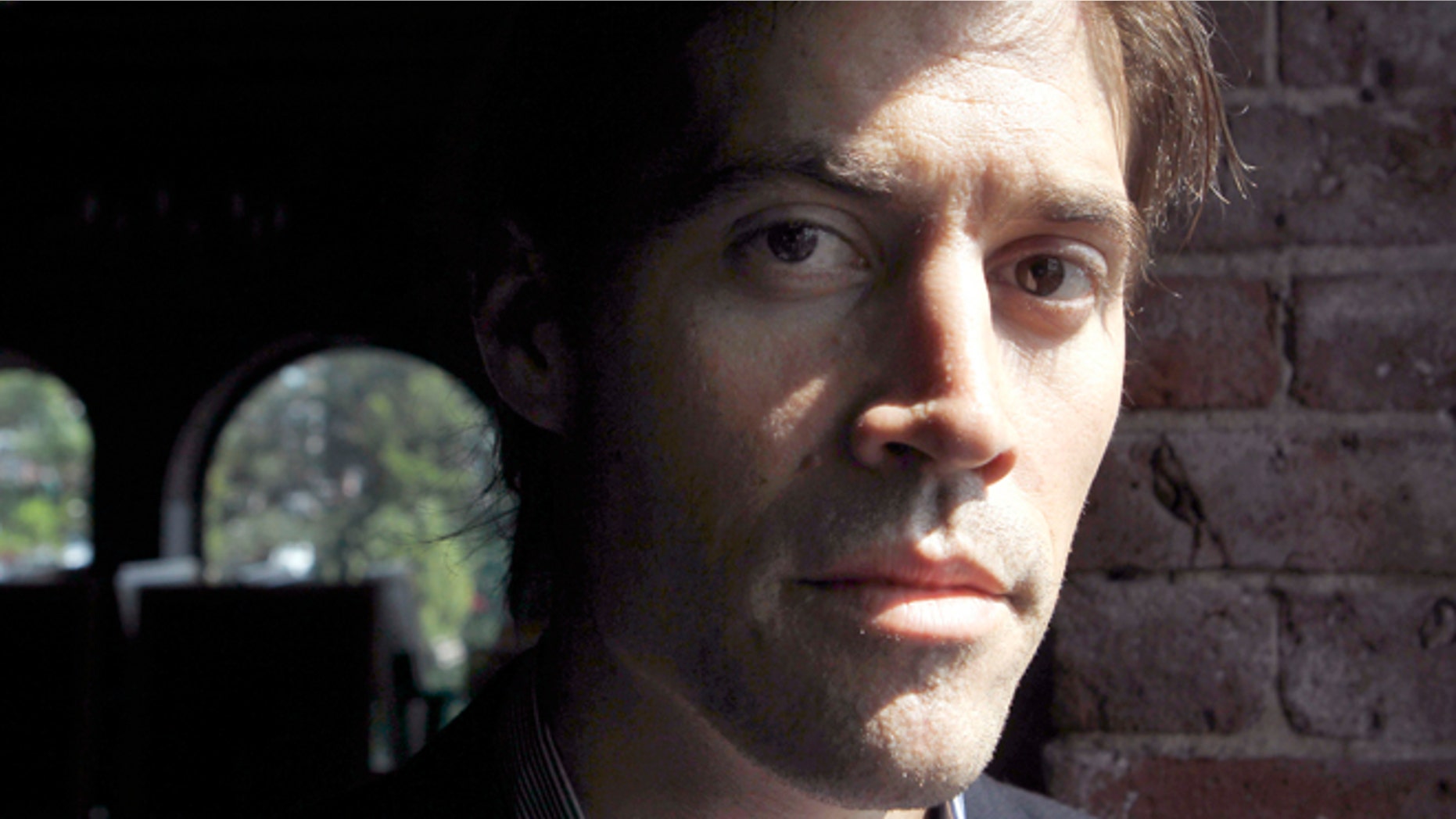 In this Friday, May 27, 2011, file photo, journalist James Foley poses for a photo during an interview with The Associated Press, in Boston.