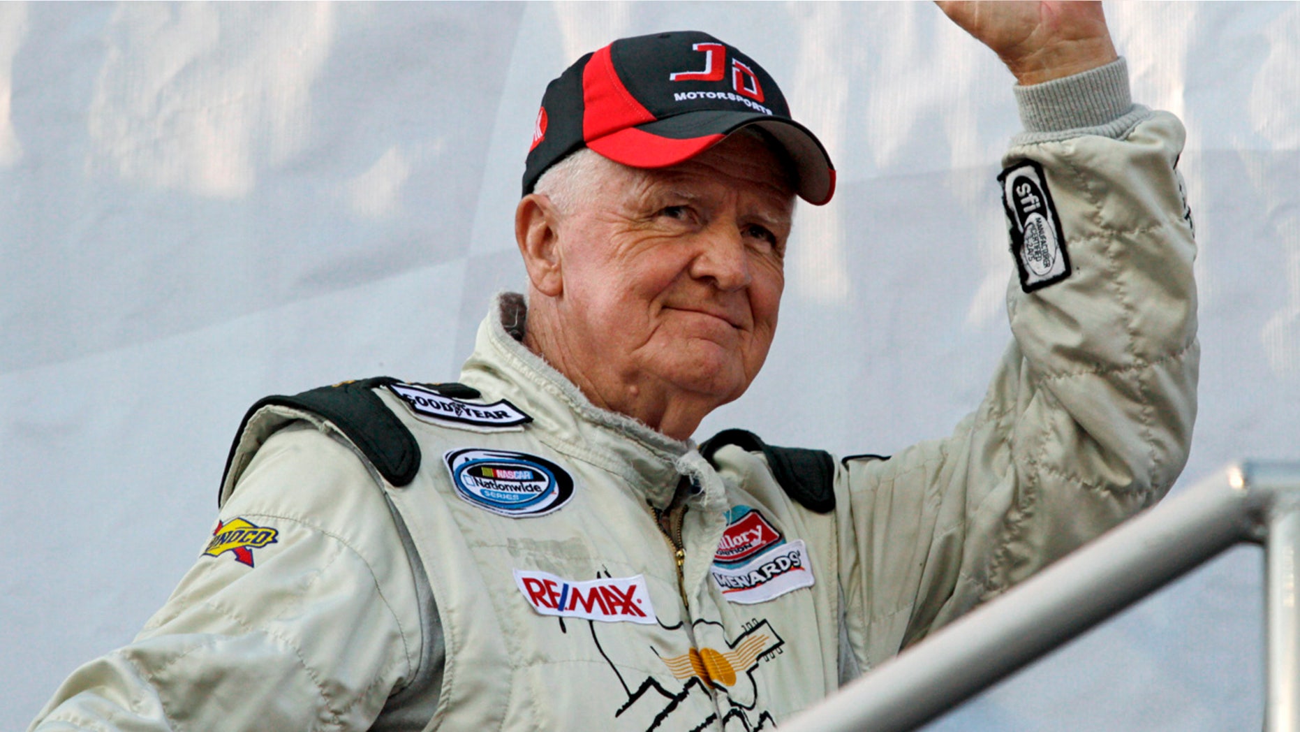 In this May 6, 2011, file photo, James Hylton waves to the crowd during driver introductions for the NASCAR Nationwide Series auto race at Darlington Raceway in Darlington, S.C