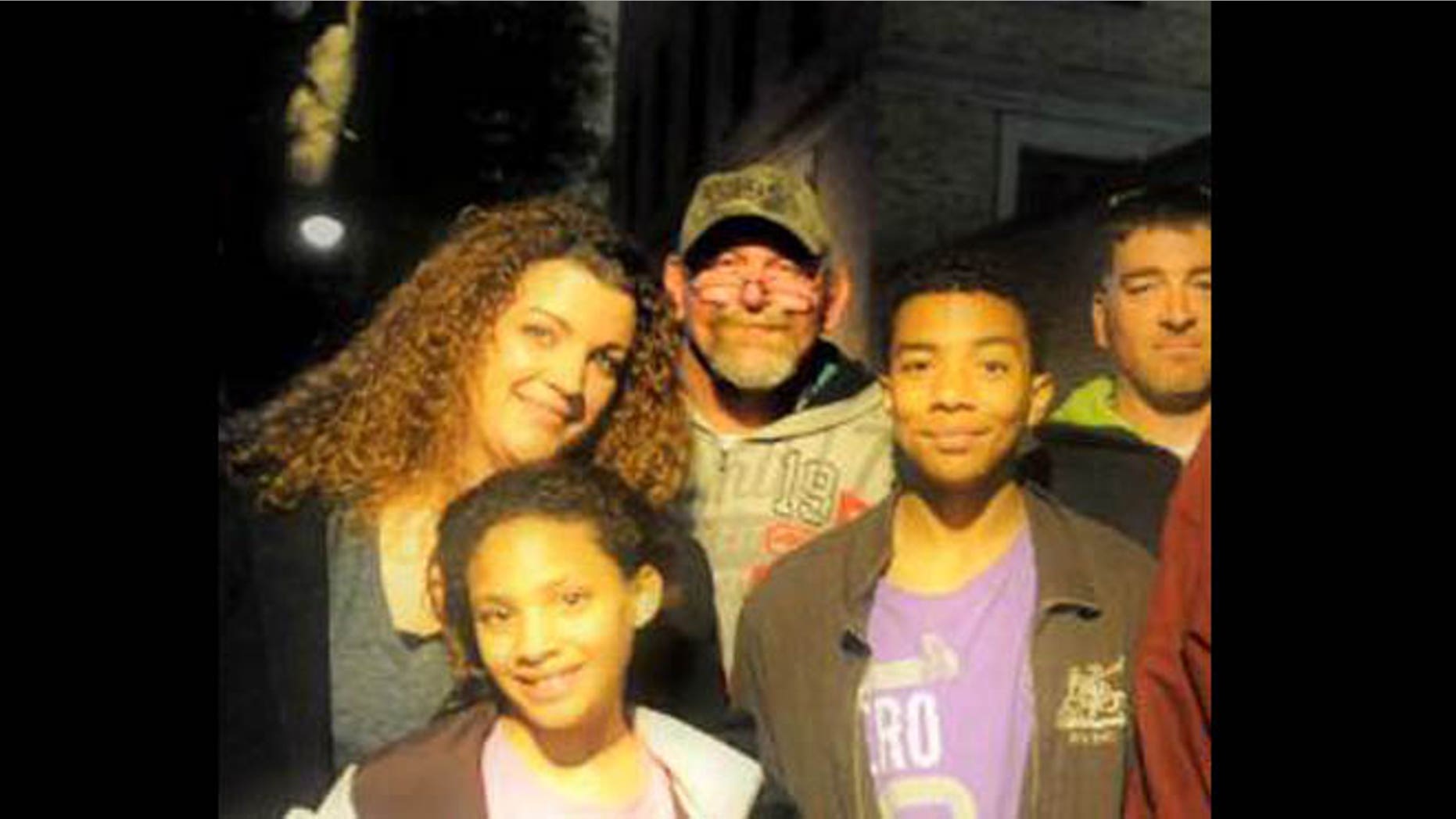 James Kelly, pictured center.