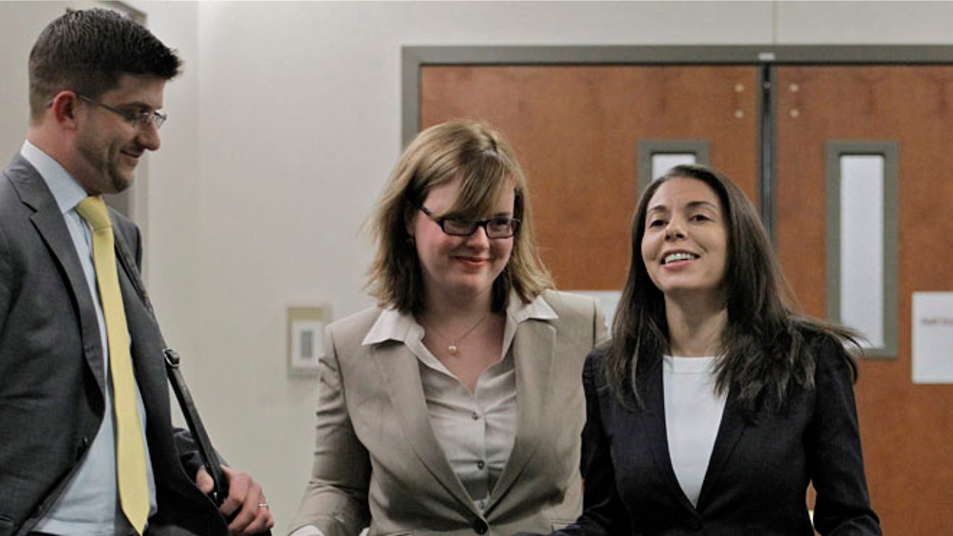 FoxNews.com reporter Jana Winter, right, and her attorneys battled the Colorado decision in a case that finally ended when the US Supreme Court left in place a New York court's decision.