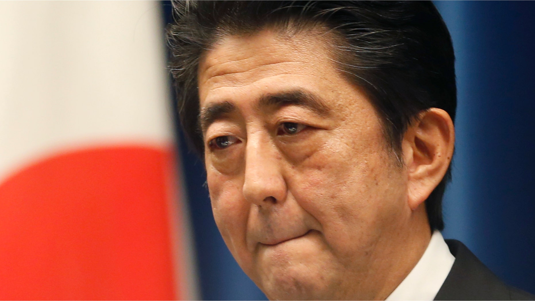 Nov. 18, 2014: Japan's Prime Minister Shinzo Abe reacts to a question during a press conference at his official residence in Tokyo