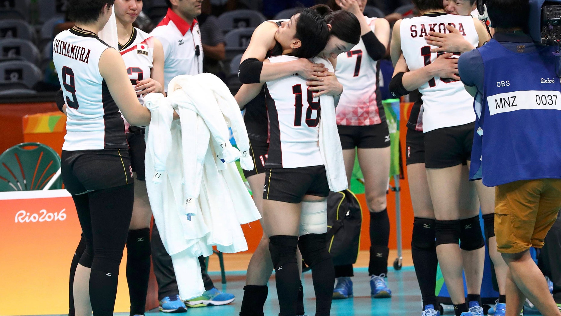 File photo: 2016 Rio Olympics - Volleyball Women's Quarterfinals - Japan v USA - Maracanazinho - Rio de Janeiro, Brazil - 16/08/2016. Japanese team players reacts after losing to the USA. (REUTERS/Yves Herman)