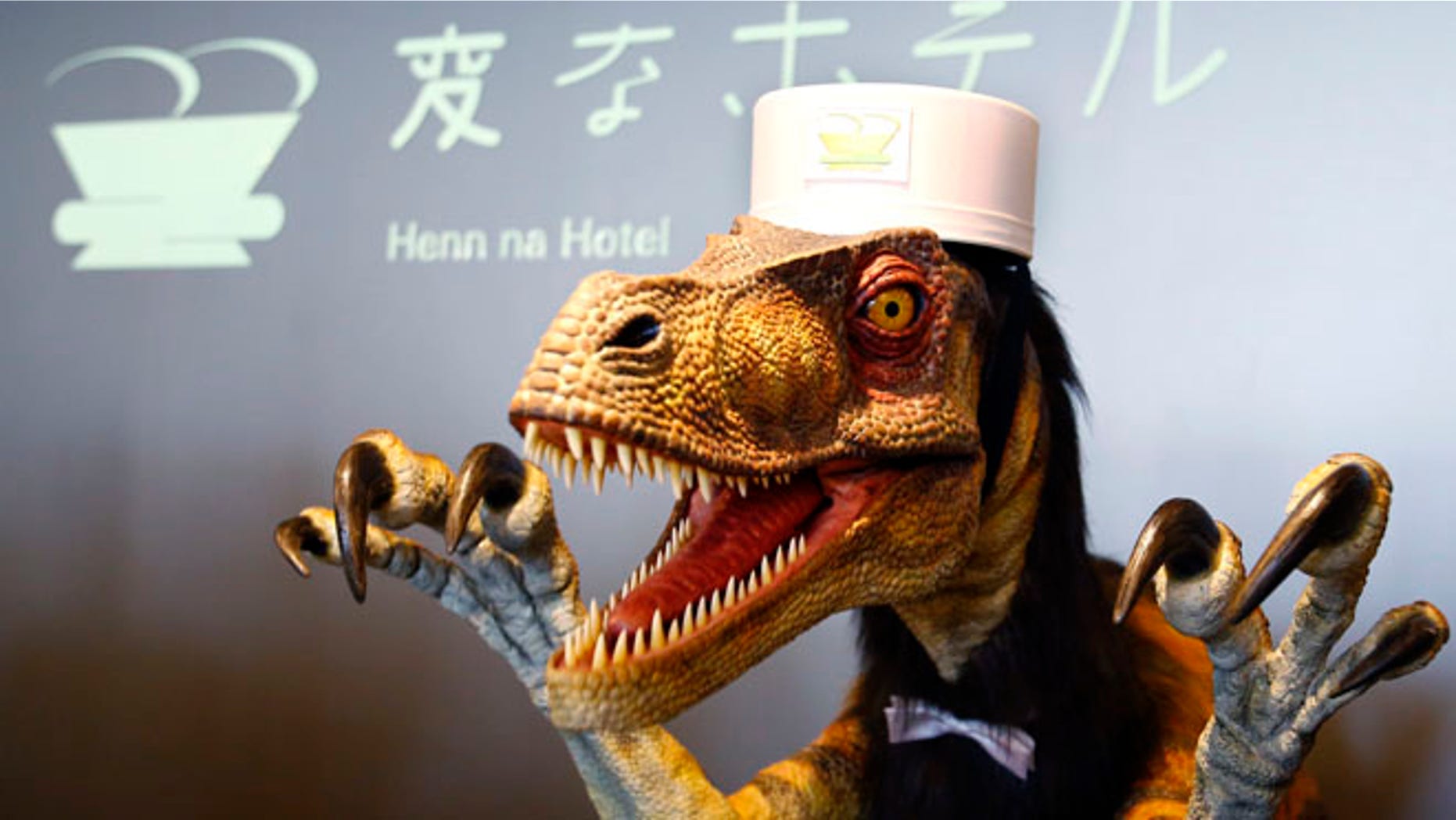 A receptionist dinosaur robot performs at a new hotel, aptly called Henn na Hotel or Weird Hotel, in Sasebo, southwestern Japan.