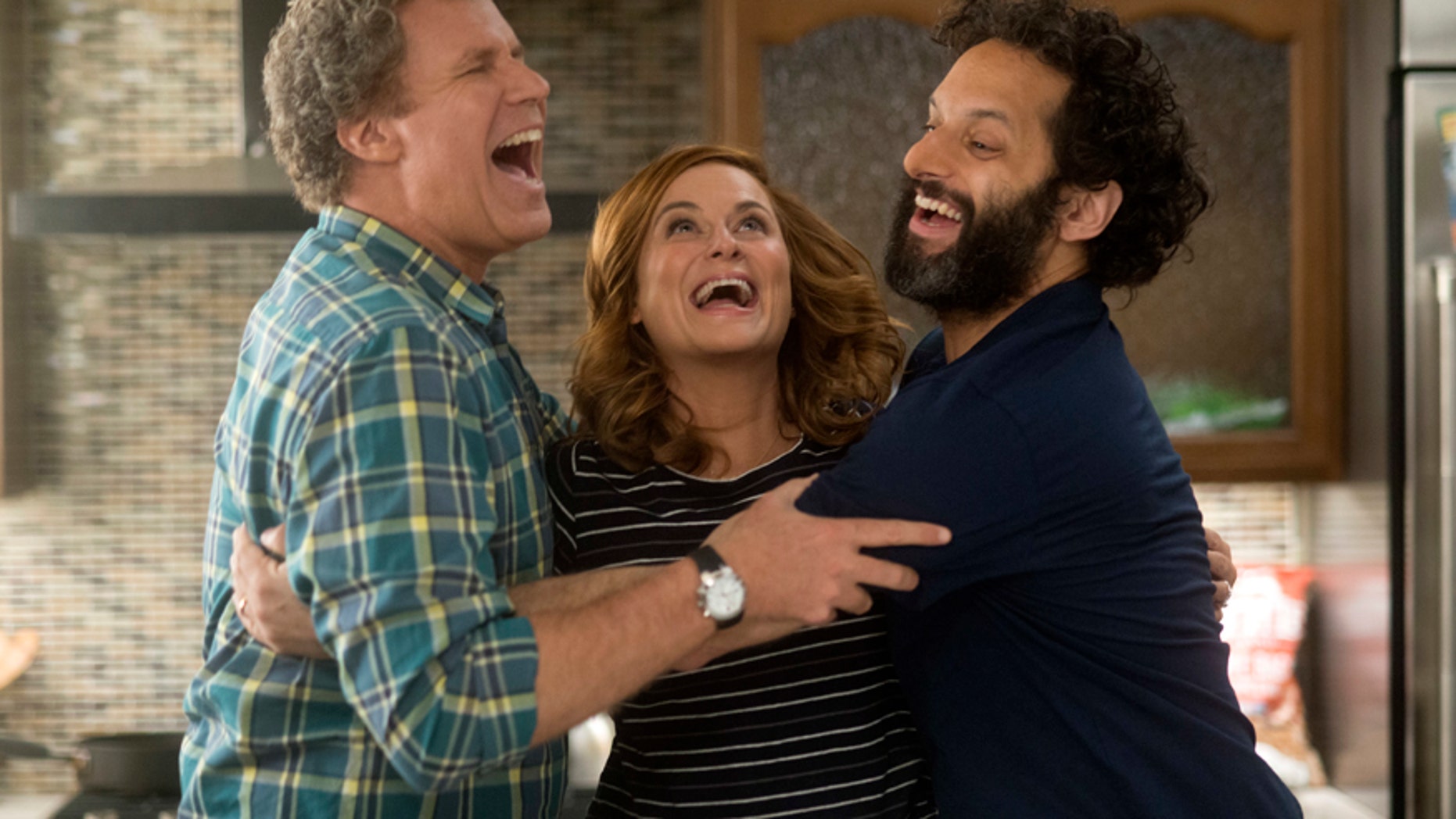 This image released by Warner Bros Pictures shows, from left, Will Ferrell, Amy Poehler and Jason Mantzoukas in a scene from "The House."