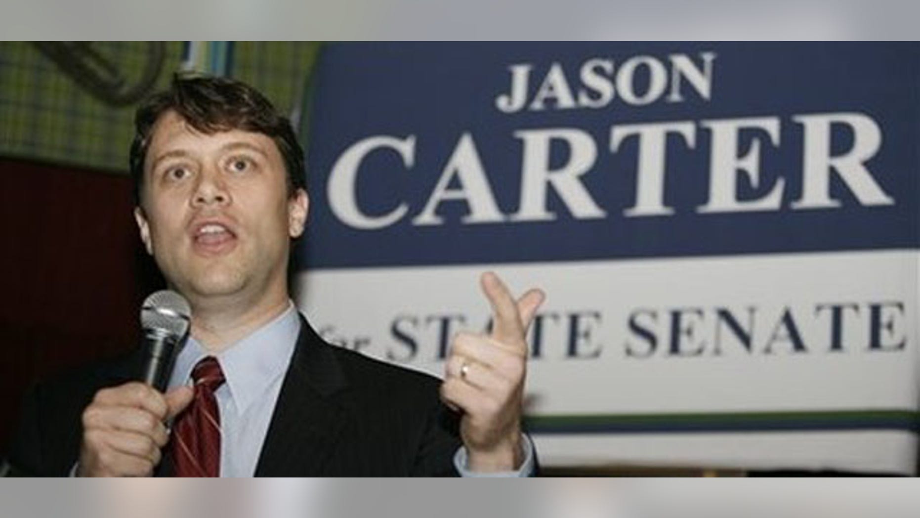 Dec. 9: Atlanta attorney Jason Carter, grandson of former President Jimmy Carter, announces his candidacy for the Georgia state Senate at a restaurant in Decatur, Ga. (AP Photos)