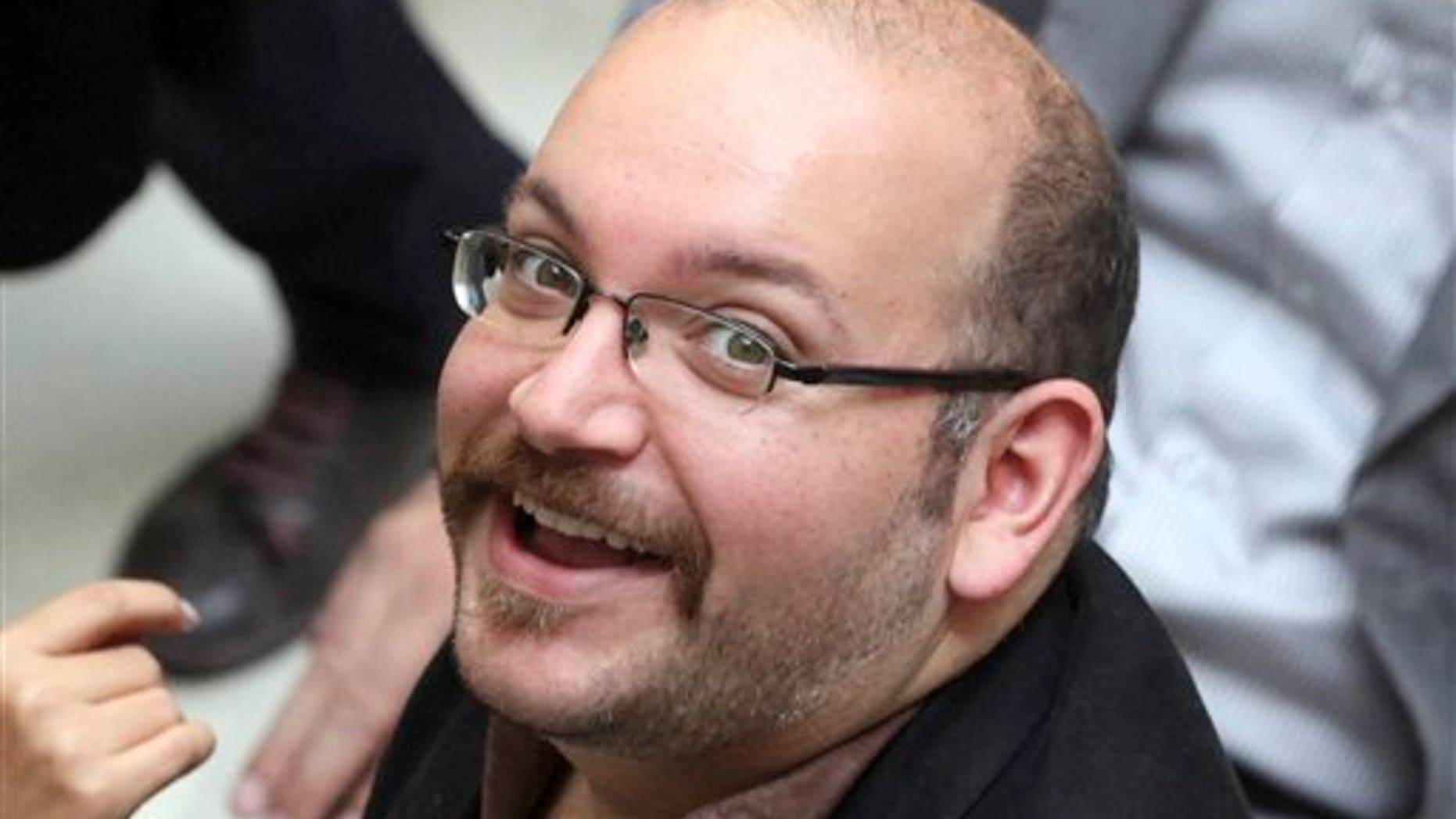 FILE: April 11, 2013: Jason Rezaian, an Iranian-American correspondent for the Washington Post, at a presidential campaign of President Hassan Rouhani in Tehran, Iran. (AP)