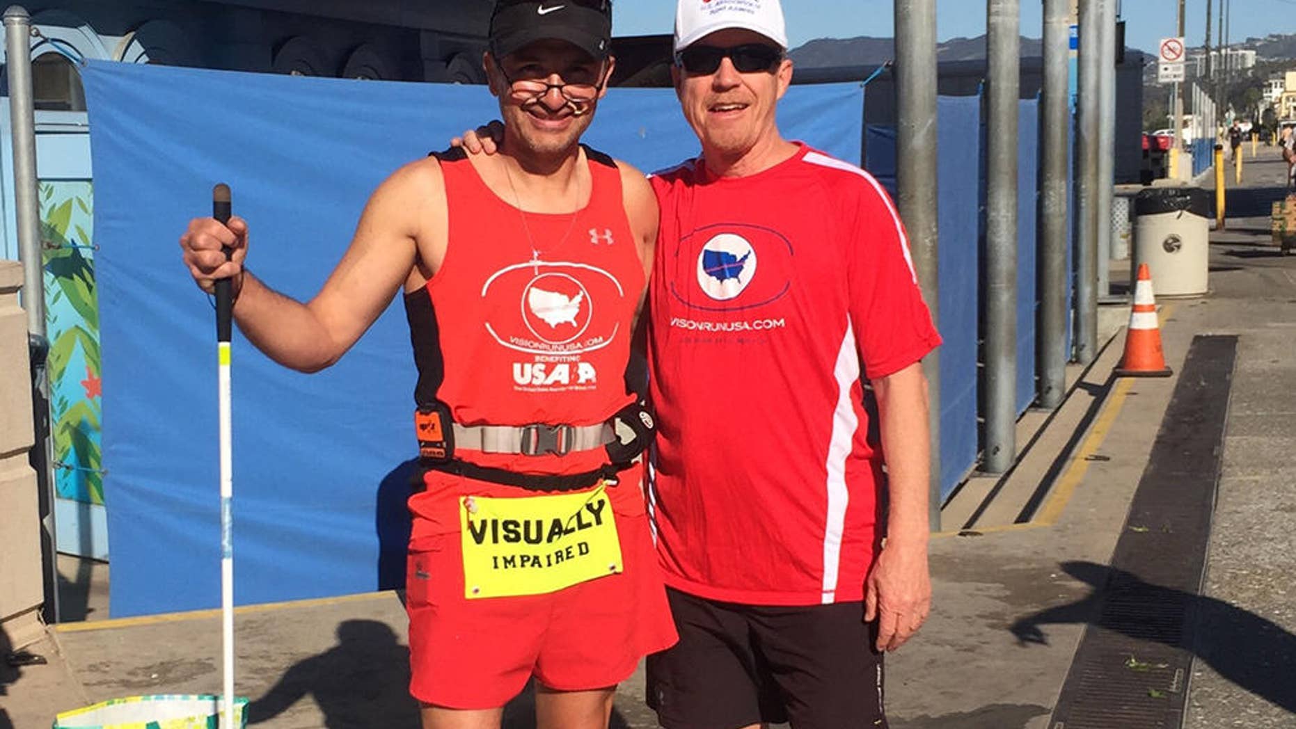 Jason Romero (left) and USABA executive director Mark Lucas at the start of Romero's cross country run. PHOTOGRAPH COURTESY OF UNITED STATES ASSOCIATION OF BLIND ATHLETES