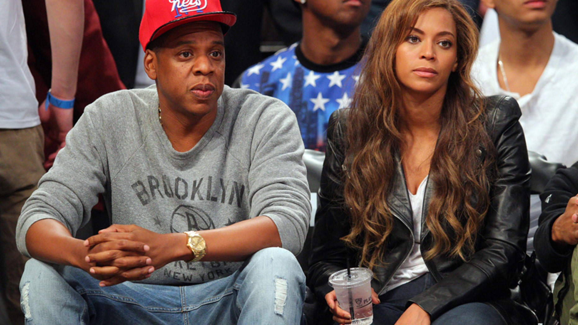 May 2, 2014; Brooklyn, NY, USA; Recording artists Jay-Z and Beyonce look on during the third quarter of game six of the first round of the 2014 NBA Playoffs between the Brooklyn Nets and the Toronto Raptors at Barclays Center.