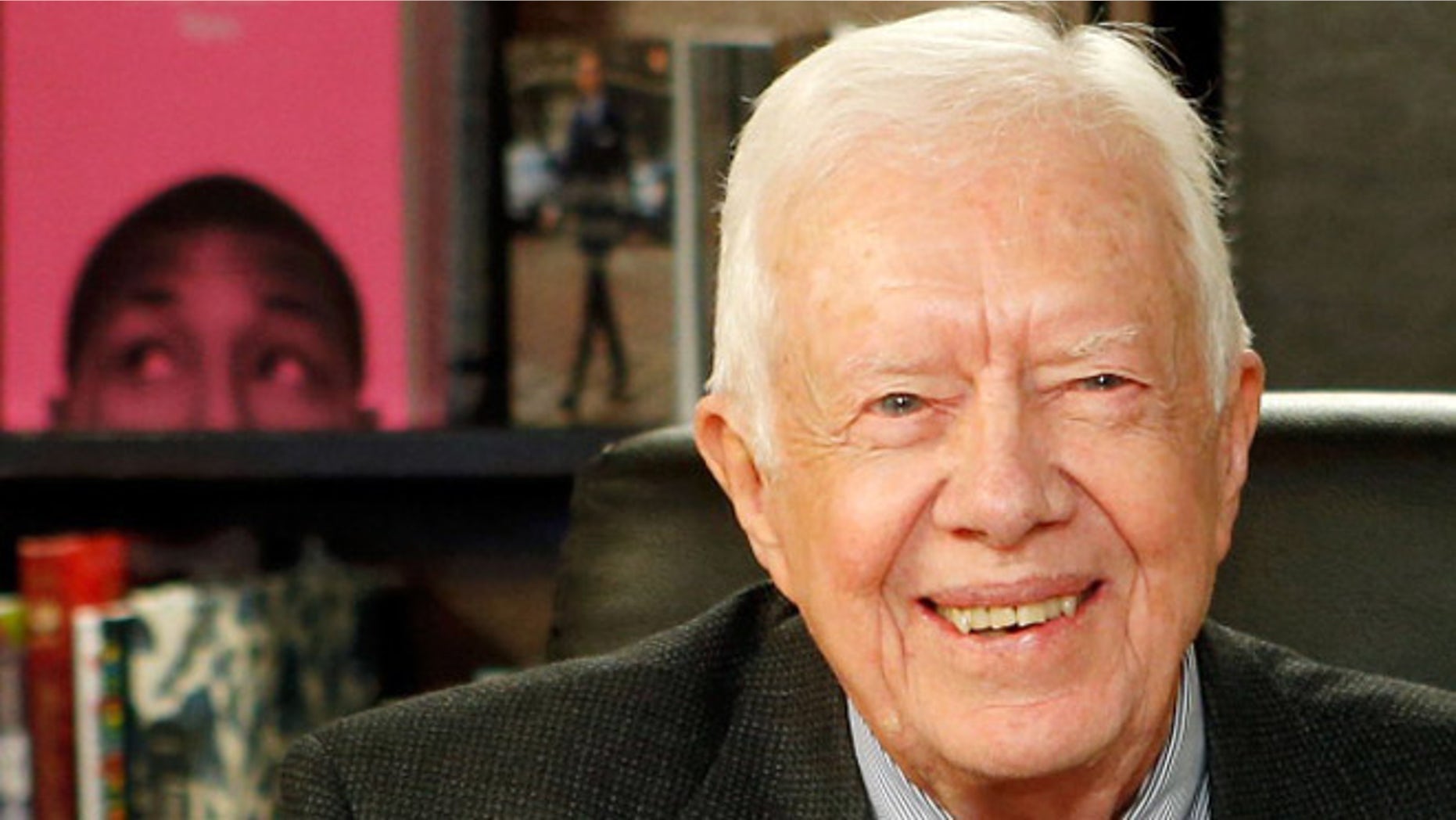 Former US President Jimmy Carter poses for a photo as he promotes his new book at Barnes & Noble, 5th Avenue on March 25, 2014 in New York City.