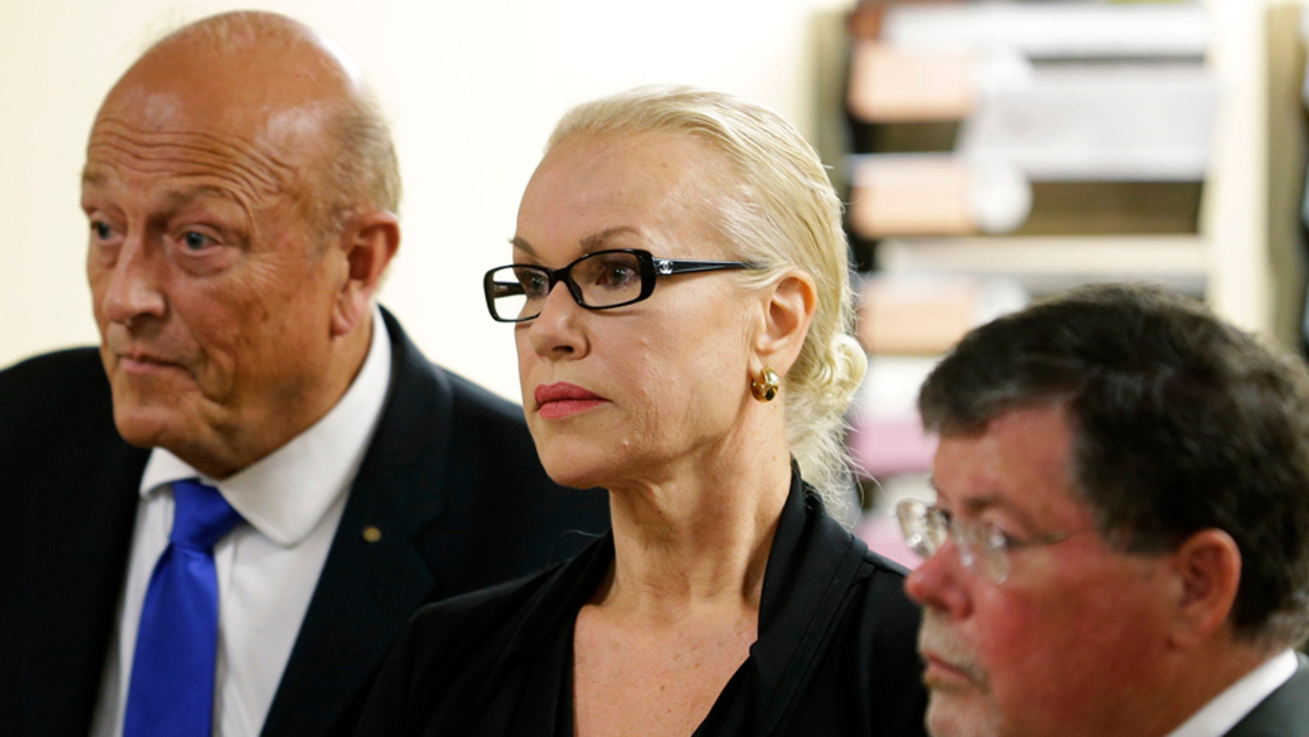 May 30, 2014. Jean Kasem, center, the wife of ailing radio personality Casey Kasem, appears in Kitsap County Superior Court, with her attorneys Joel Paget, left, and Steve Olsen in Port Orchard, Wash.
