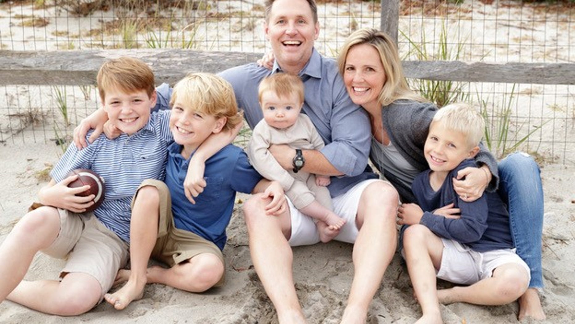 Jeannie Cunnion with her husband and their four sons.