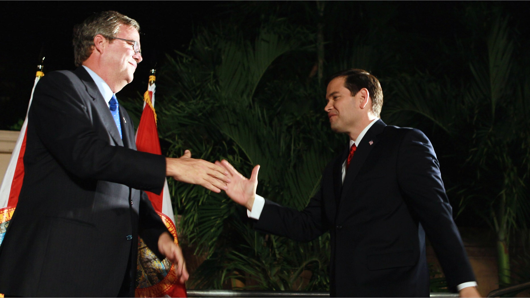 Former Florida Gov. Jeb Bush, left, and Florida Sen. Marco Rubio.
