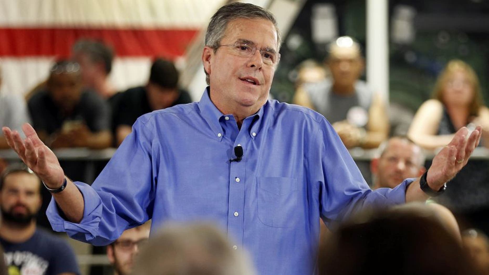 Republican presidential candidate former Florida Gov. Jeb Bush a speaks to employees at Foss Manufacturing during campaign stop Thursday, Sept. 3, 2015, in Hampton. N.H. (AP Photo/Jim Cole)