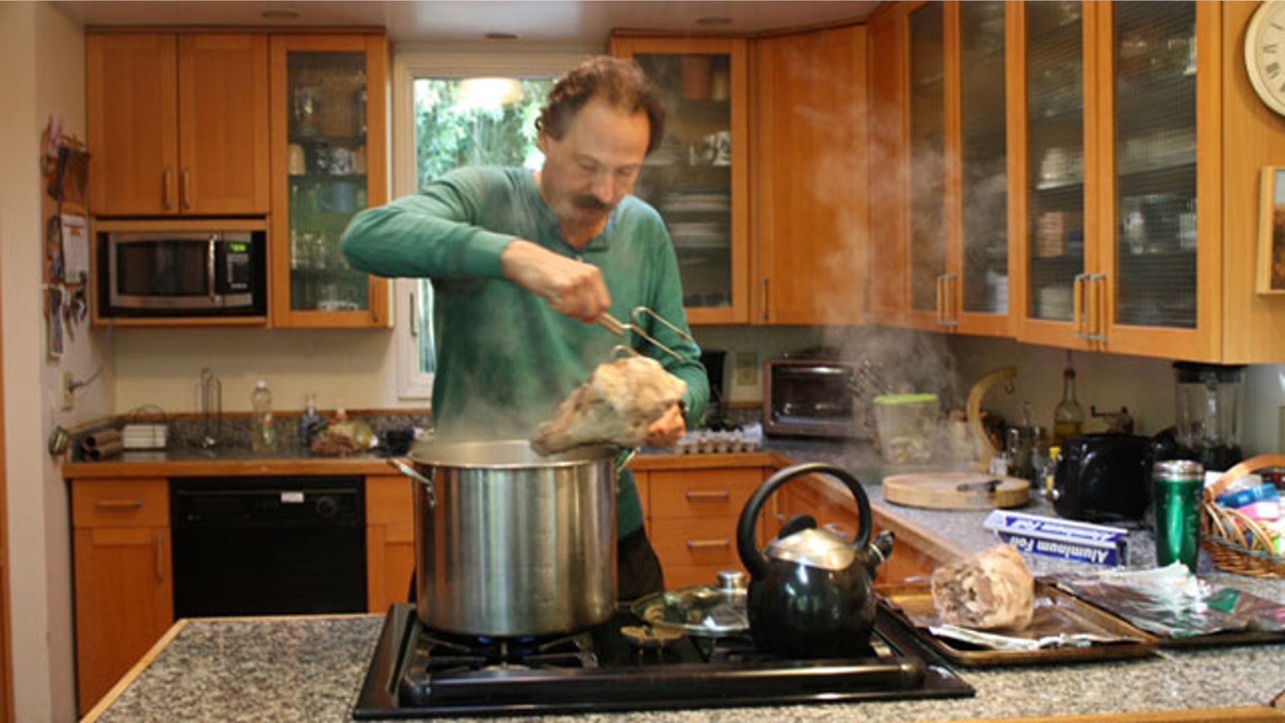 Jeff the cheapskate boils a goat head.