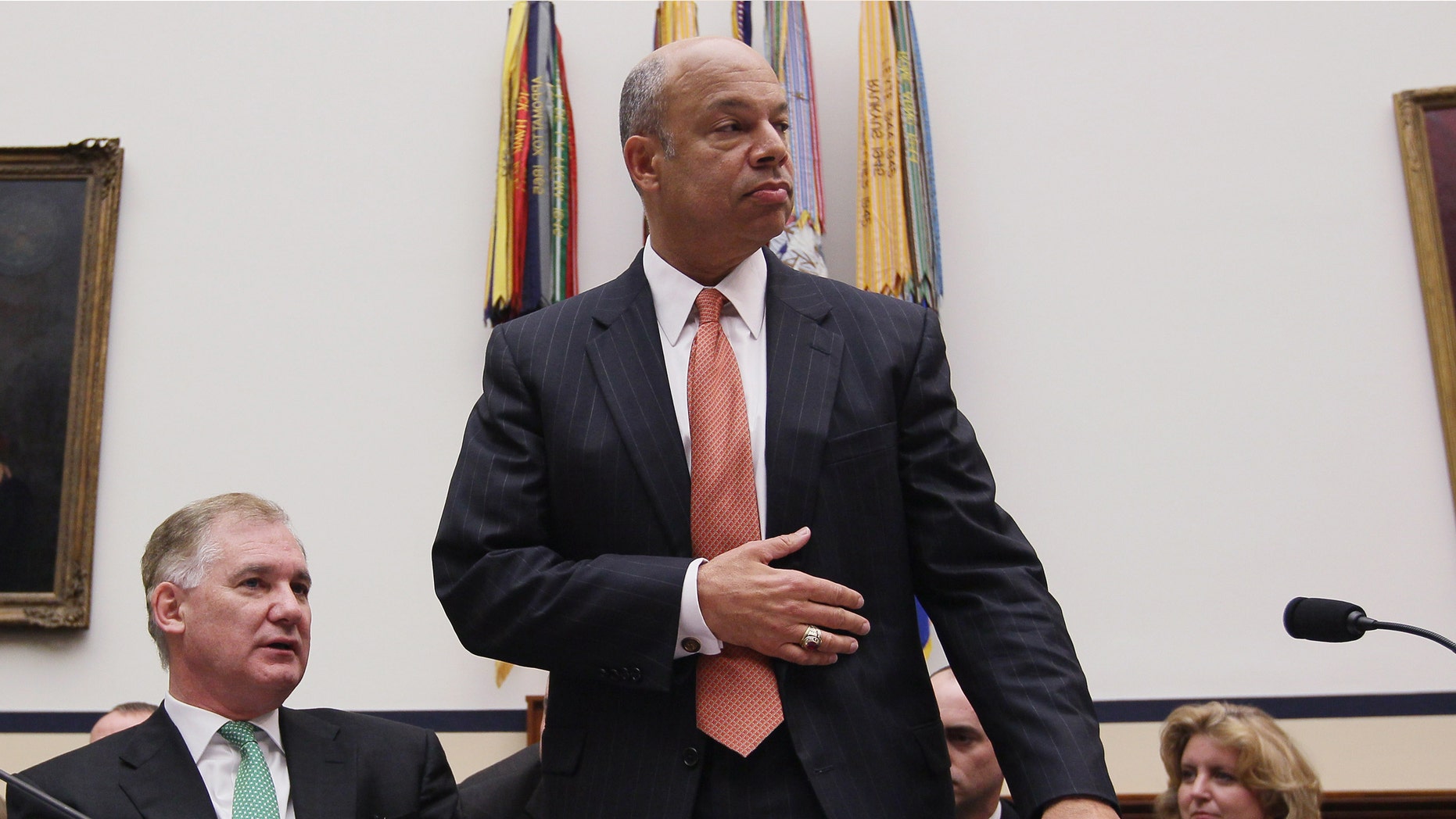 WASHINGTON, DC - MARCH 17: Defense Department General Counsel Jeh Johnson (R) and Deputy Defense Secretary William Lynn (L) attend a House Armed Services Committee hearing on March 17, 2011 in Washington, DC. The committee is hearing testimony from Pentagon officials on President Obamaâs executive order that establishes periodic review boards for Guantanamo Bay detainees. (Photo by Mark Wilson/Getty Images)
